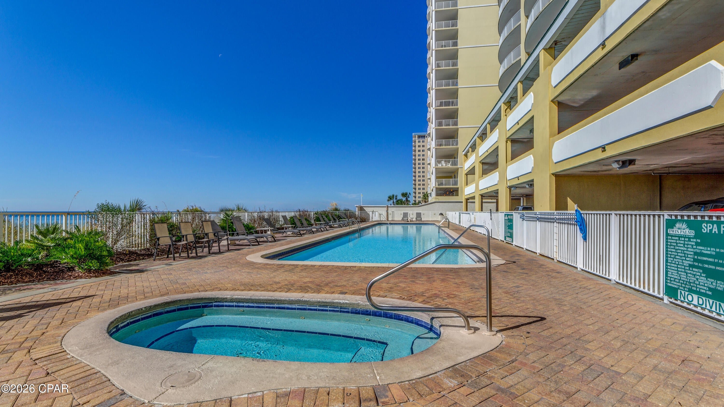 Gulf-front living, incredible views, and rental potential in the heart of Panama City Beach! This centrally located 2-bedroom, 2-bathroom condo at Twin Palms offers the perfect combination of a thoughtful floor plan, resort-style amenities, and a location that puts you right in the middle of everything that makes the beach so much fun!

Step inside to an open and inviting living, dining, and kitchen area designed for easy living and entertaining. The spacious layout flows onto an oversized balcony where you can soak up breathtaking Gulf views. The primary suite also opens directly to the balcony, giving you the perfect spot to wake up to turquoise water views or unwind with a sunset.

The split-bedroom floor plan provides privacy for everyone, making this condo ideal for family vacations, weekend getaways, or hosting guests. And for buyers looking for an investment opportunity, Twin Palms offers the potential to generate rental income while giving you a place to enjoy for yourself when you're ready for some beach time.

The location is hard to beat! Grocery runs are easy with Walmart just minutes away, while some of the area's favorite local spots are right around the corner. Grab breakfast or lunch at Sunrise Cafe, tacos at Juan Taco, a meal and daiquiri at Pineapple Willy's, or satisfy your sweet tooth at Beach Cow Creamery or Parlor Donuts. Whatever you need, you're never far from several options! 

Twin Palms sits directly on the Gulf and offers an impressive lineup of amenities, including private beach access, a beachfront pool, indoor and outdoor hot tubs, sauna, steam room, fitness center, and convenient gated parking located directly beneath the complex.

If you're searching for a vacation home, investment property, or a little bit of both, this one checks the boxes! Beautiful Gulf views, resort-style amenities, a prime location, and plenty of nearby restaurants, shopping, and entertainment make this a property worth seeing in person. Come take a look and start imagining your next beach day here!