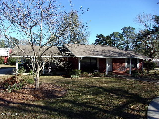 Nice Intown Home on corner lot. 2 Bedroom Brick Home on almost half acre lot. All large rooms. Hardwood floors in living room, dinning room and hallway. Custom wooden blinds. New carpet in bedrooms. Nice Garden window in kitchen. Skylight in kitchen and bathroom.  Carport. Patio area. Circle Drive. Nice front porch for swing. Perfect starter home or retirement home. Close to shopping and churches.  Check it out today!!