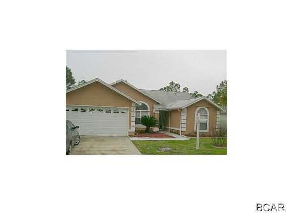 Very nice WATERFRONT home in gated community with cathedral ceiling, open floor plan, ceramic tile and carpet, deck overlooking the lake, 3rd bedroom could be divided into 4th bedroom, and 2-car garage.