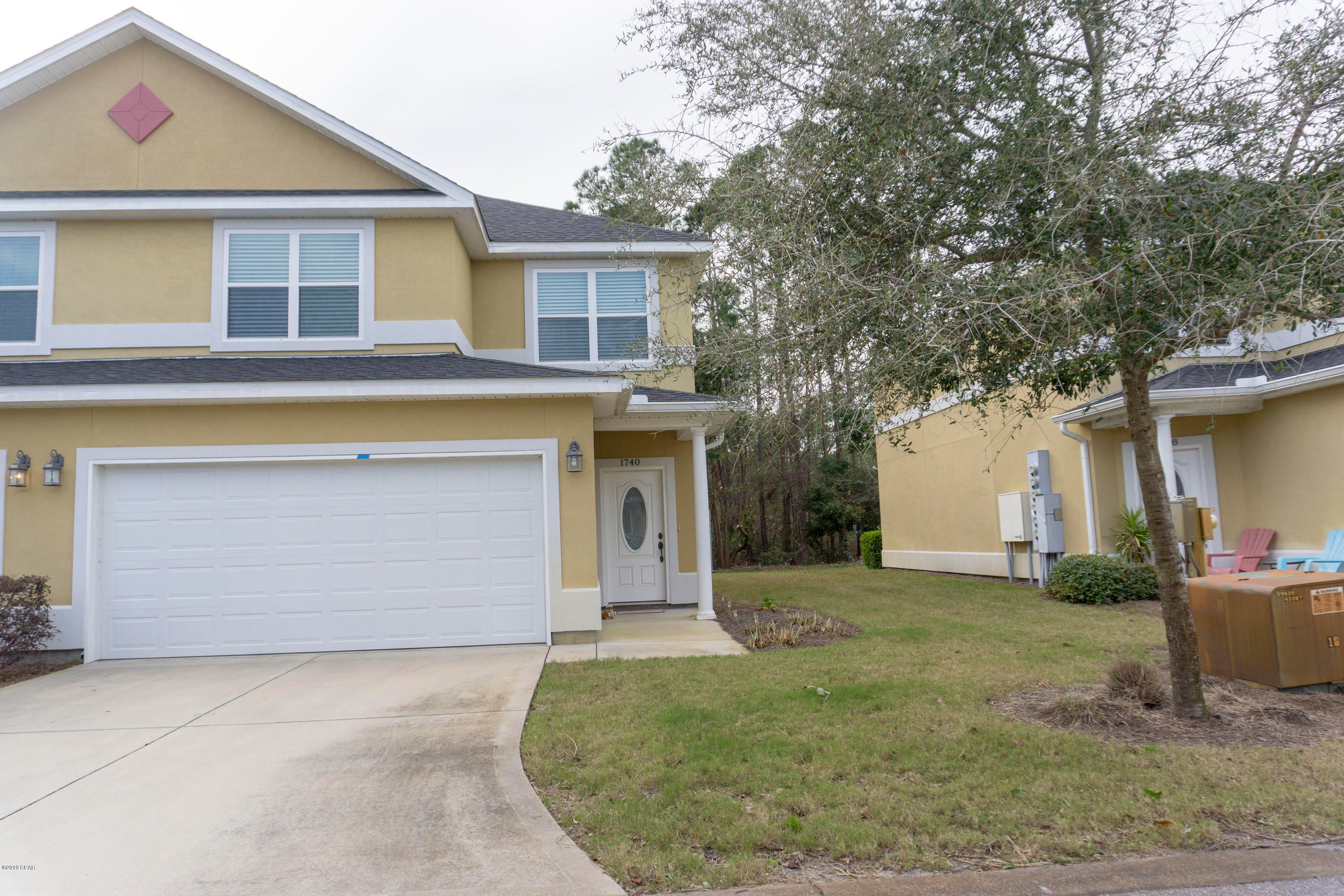 Great Annabella's end unit that backs up to woods.  This three bedroom unit has fresh paint and tasteful updates, such as kitchen back splash.  The two car garage is a rare find for a town house and has two additional parking space in driveway.  Annabella's is a beautifully landscaped gated community with a club house and pool.  Exterior maintenance and insurance is covered by hoa for hassle free lifestyle.  This townhouse is move in ready and is conveniently located on the West side of Hathaway Bridge.