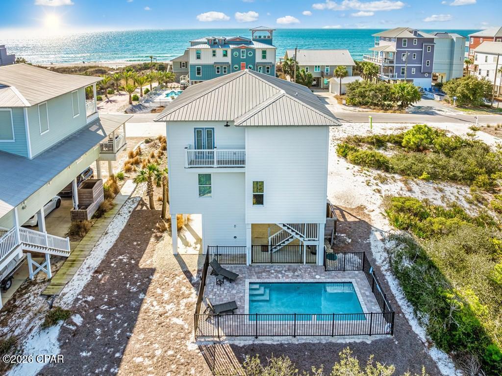 FIRST TIER | X FLOOD ZONE | GULF VIEWS | PRIVATE POOL Experience the best of Cape San Blas in this beautifully maintained 4-bedroom, 3-bath beach home, perfectly positioned on the first tier with Gulf views and located in the desirable X Flood Zone, which could save thousands of dollars on flood insurance. Designed for effortless coastal living, the open-concept floor plan is filled with natural light and offers plenty of space for gathering with family and friends. The well-appointed kitchen features granite countertops, stainless steel appliances, and flows seamlessly into the living and dining areas. Multiple covered decks provide the perfect place to enjoy your morning coffee, take in breathtaking sunsets, or simply relax while listening to the waves. The spacious primary suite serves as a private retreat with its own balcony, beautiful Gulf views, and an ensuite bath. Three additional bedrooms offer comfortable accommodations for guests, making this home ideal as a primary residence, second home, or vacation rental. Outside, your private backyard oasis awaits. Take a refreshing dip in the pool, lounge in the Florida sunshine, or unwind after a day spent on the beach. Sold fully furnished and rental-ready, this home is ready to enjoy from day one. Owners in Ocean Haven enjoy deeded beach access via a private boardwalk leading to the sugar-white, pet-friendly beaches of Cape San Blas. Conveniently located just minutes from local shopping, the Cape's popular Bike Path, and the entrance to St. Joseph Peninsula State Park, this home offers the perfect combination of privacy, convenience, and coastal beauty. Don't miss this exceptional opportunity to own your slice of paradise on Cape San Blas. This house has an elevator shaft for those wishing to put one in.  Schedule your showing today.
