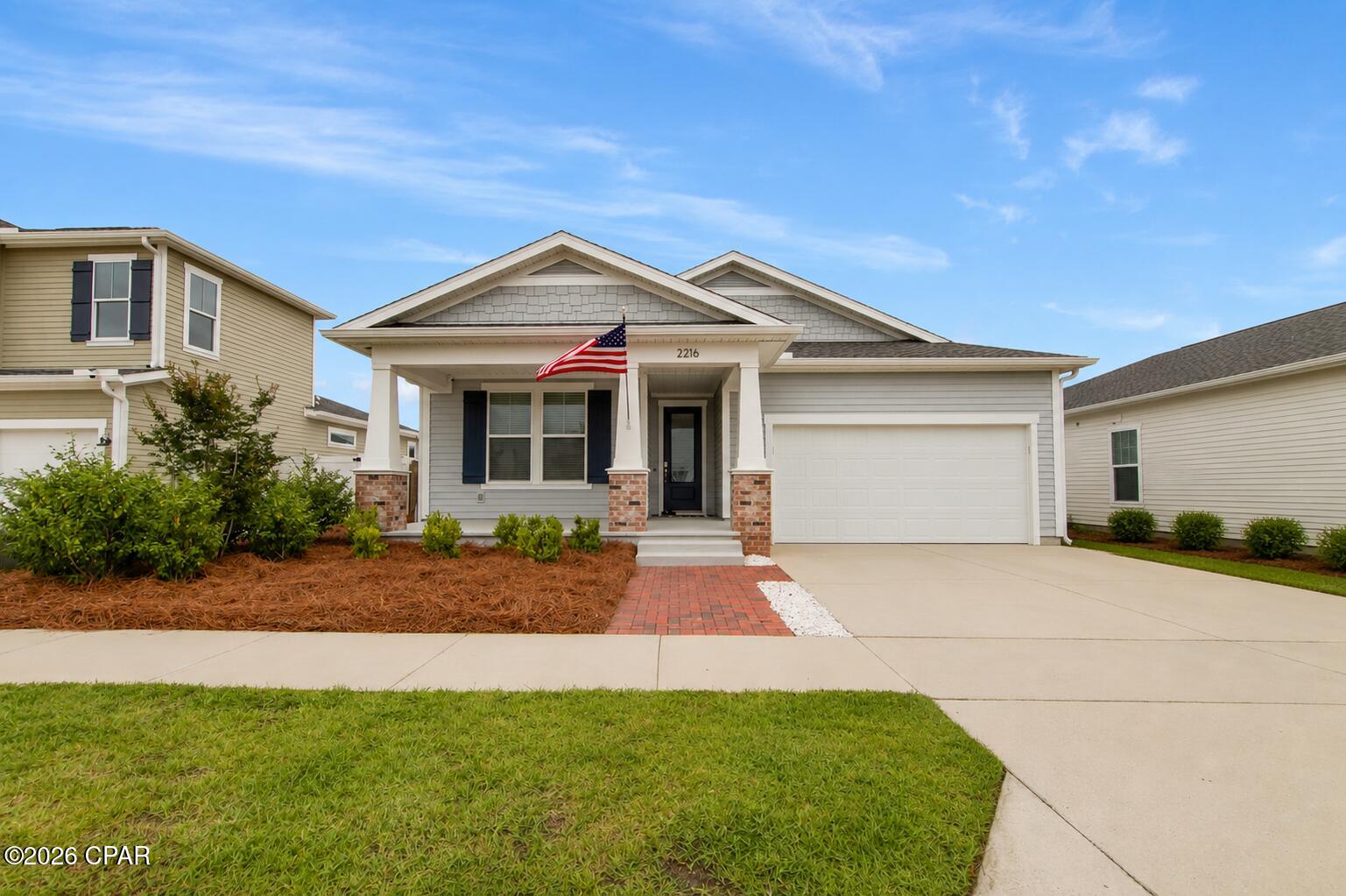 Welcome to 2216 Calamint Street in SweetBay! Featuring the Venice floor plan, this beautifully maintained 3-bedroom, 2-bath home with a den/flex room offers, 2,008 square feet of thoughtfully designed living space.

The open-concept layout features a spacious island kitchen with quartz countertops, stainless steel appliances, a gas range, tile backsplash, under-cabinet lighting, 42'' upper cabinets, and a huge walk-in pantry. The private owner's suite boasts a trey ceiling, tile-to-ceiling shower, and an expansive walk-in closet. Enjoy both covered front and rear porches, perfect for relaxing or entertaining.

Located in the highly sought-after SweetBay community, residents enjoy access to resort-style amenities including a junior Olympic pool, parks, sports courts, miles of walking and biking trails, and a community dock with Bay access for kayaking, paddleboarding, and fishing. 

Conveniently located near shopping and dining, this home offers the perfect blend of modern comfort and coastal community living. Don't miss out!