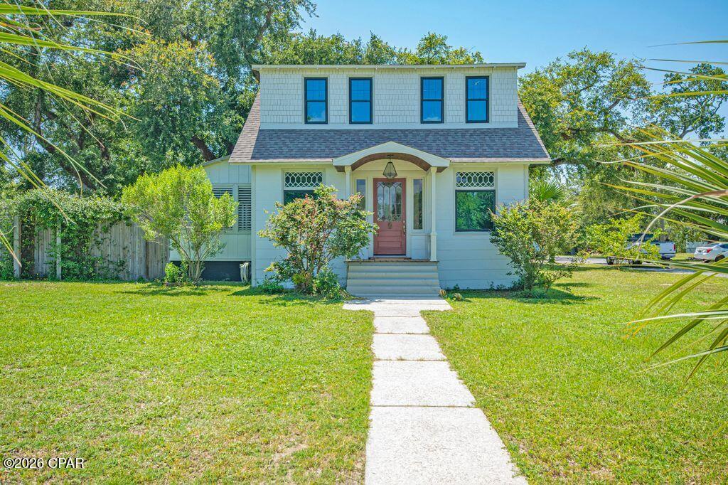 This beautiful home is truly a part of Panama City history as it was originally built in 1911. Put that together with the modern revitalization and you end up this truly gorgeous property. From the modern kitchen all equipped with Viking appliances quartzite countertops to the newly completed bathrooms with all of today's comfort pleasures, garden tub walk-in shower quartzite counters. Add all these modern features without losing any of the original character of this unique property. Original Oak hardwood floors refurbished to all new condition with the original stunning built in hutch cabinets separating the living and dining area. Wood framed fireplace in the living room area was added in 1994. The list of great things about this warm and comforting home just keeps pleasing you as you make your way through this great home.  Here is the major improvement list completed in just the last few years. Both A/Cs are just a couple of years old. Double hung double pane windows throughout. Home received a complete rewiring throughout in 2020. All new plumbing of the entire home in 2019. New roof in 2023. Vapor barrier and all new blown insulation in 2019. And of course, all properly permitted with copies of all permits in hand. Let's go to the fun part now. The large inground private pool was completely redone in 2022 as it was replastered and retiled with new timer electric outlet and LED light in 2022. The lot is a large corner lot with trees and landscaping that fit the house just right. The property backyard is fully fenced for the family privacy we all look for There is a separate 2 car garage along with a LARGE separate shed in the yard for any project you choose to challenge.  The only things remaining to be completed are in one room where the original flooring is settling and a sometime small leak where the front of the home is connected to separate enclosed front porch and the fireplace needs a new insert. The seller is making a financial concession of #$35,000.00 as professional estimates are available. This magnificent property is going to make a very lucky family a beautiful home with years of memories and enjoyment. Assumable Terminate Bond on the home.