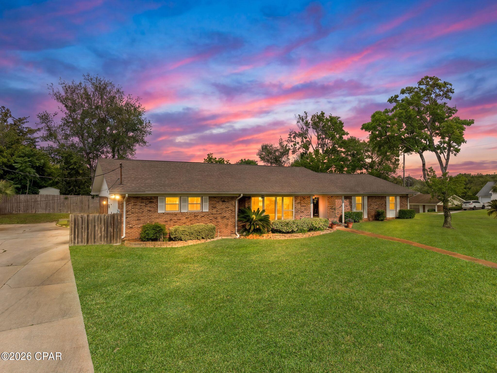 UNMATCHED VALUE ON THE WEST END! 

This exceptional 4-bedroom, 2.5-bathroom all-brick ranch offers the absolute best price per square foot in the neighborhood. Perfectly situated on a massive 0.45-acre corner lot with NO HOA, this property is fully approved for short-term rentals (STR) and comes beautifully furnished (all main decor included)--making it the ultimate turnkey investment or move-in ready beach home!

Step inside to an expansive great room that flows seamlessly into a bright, modern kitchen with updated appliances, premium finishes, and a spacious dining area. Need extra space? The large 16x16 bonus flex room provides endless versatility as a 5th bedroom option, home office, or media room.

Major structural upgrades offer total peace of mind: a 2018 roof, high-impact rated windows with solar-tinted glass for maximum energy efficiency, and a climate-controlled garage with a dedicated mini-split AC-perfect for a workshop or golf cart storage.

Nestled safely in preferred Flood Zone X (no flood insurance required by most lenders!), you are just a quick golf cart ride to the beach, around the corner from a rare coastal dune lake and community playground, and only 1 mile from Pier Park shopping, dining, and entertainment. This property delivers the rare acreage, square footage, and cash-flow potential that is nearly impossible to find on the West End of PCB. 

See it today before this incredible deal is gone!

Buyer to verify all information and measurements deemed important.