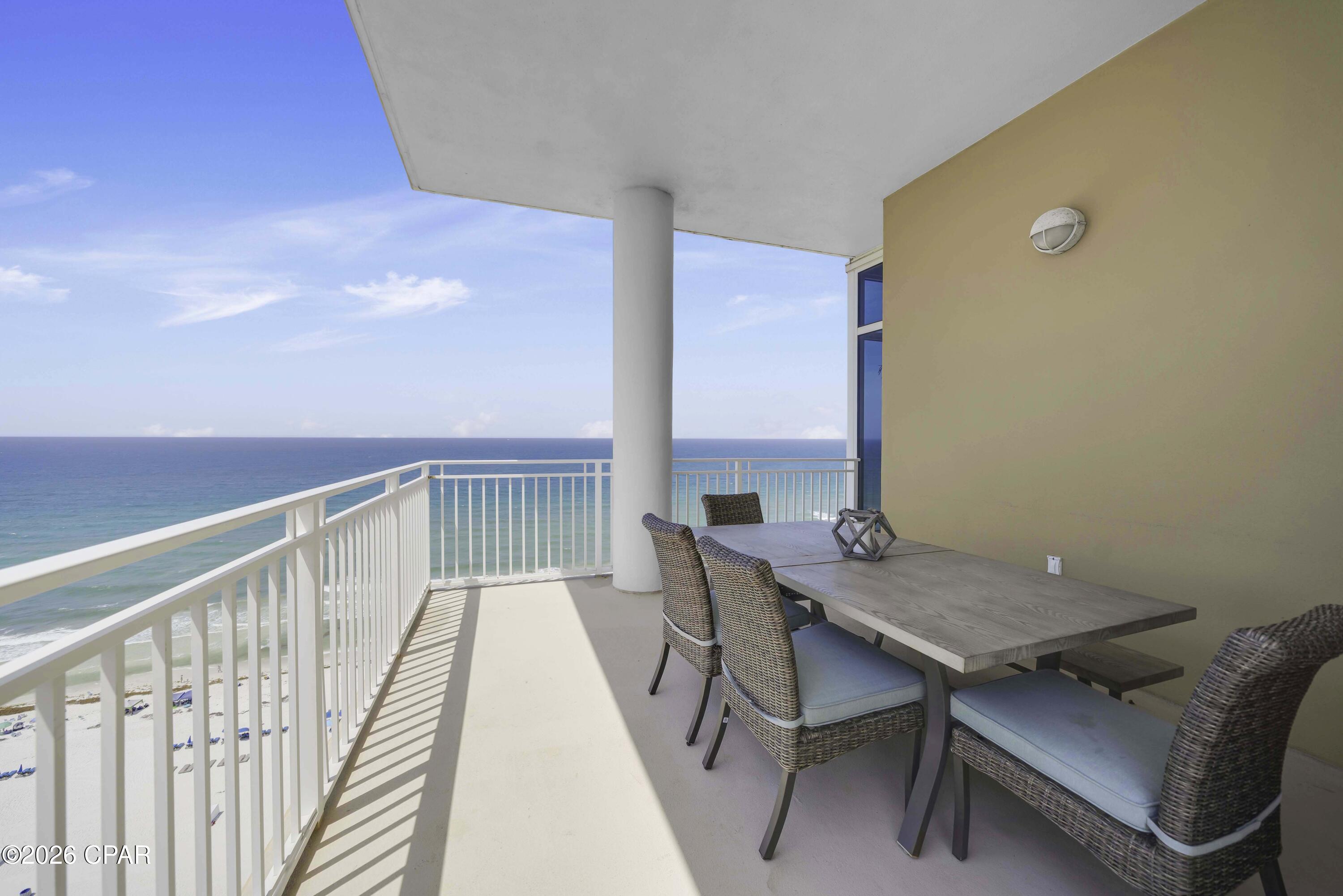 Welcome to Sterling Beach Unit 1601, a luxurious Gulf front retreat where panoramic views of the Gulf of Mexico create a stunning backdrop for the coastal life.  From the moment you enter this condominium, floor to ceiling windows will take your breath away with sweeping views of emerald waters and sandy white beaches.  This highly desirable 16th floor condominium is the perfect height to take full advantage of gorgeous beach views by day and incredible sunsets in the evening.  The living and dining area have soaring 12-foot ceilings and views of The World's Most Beautiful Beaches pour through into the unit, illuminating the spacious living area complete with fireplace.  This coastal residence features an open floor plan and offers two master suites with gulf views, each with spa inspired baths featuring jacuzzi tubs, separate showers, and double vanities. With three bedrooms and three full baths, and approximately 2300 sq. ft. of living space, there's room for everyone to gather together for entertainment or retreat to relax in privacy. This condominium features two private balconies situated to provide the perfect vantage point for sunrise or sunset views of the Gulf and the Lagoon. Sterling Beach offers unlimited resort amenities including an expansive Gulf front pool, jacuzzi, fitness center, grilling area, community room, onsite theatre and 350 feet of sugar white sand beach.   This turnkey property is beachfront living at its finest - make this your new home at the beach or investment property - call today!