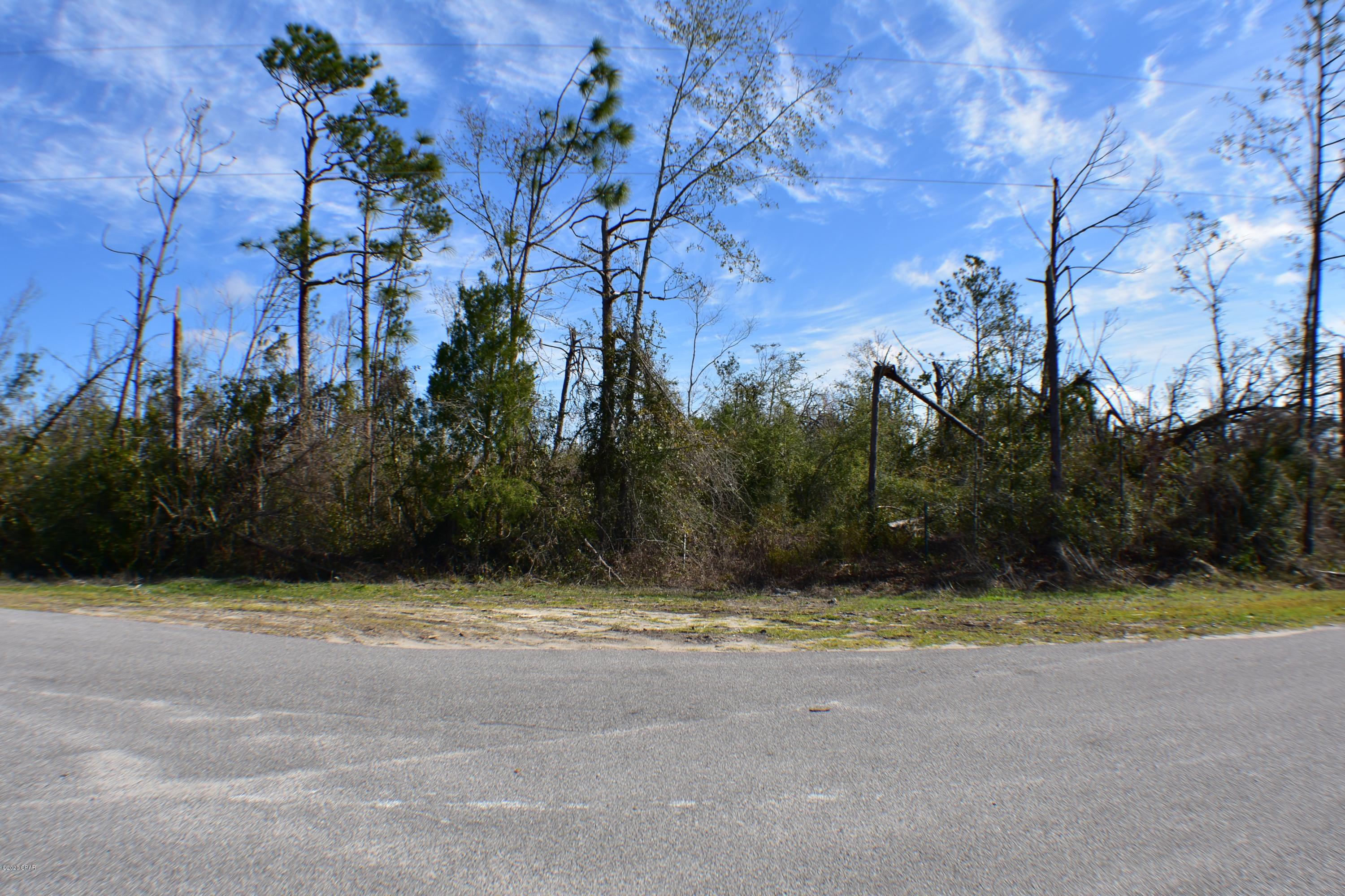 CURRENTLY UNDER CONTRACT, SELLER ACCEPTING BACKUP OFFERS.  Approx.  2.29 acre lot on a corner in the Bayou George area ready for a new home!  Power, septic and private well already in place from a previous residence.  County zoning  and easy access to Merritt Brown and Tommy Smith Schools, town, Tyndall AFB, etc...  Bring your house plans or mobile home!  All info is approx and must be verified by Buyers if important.