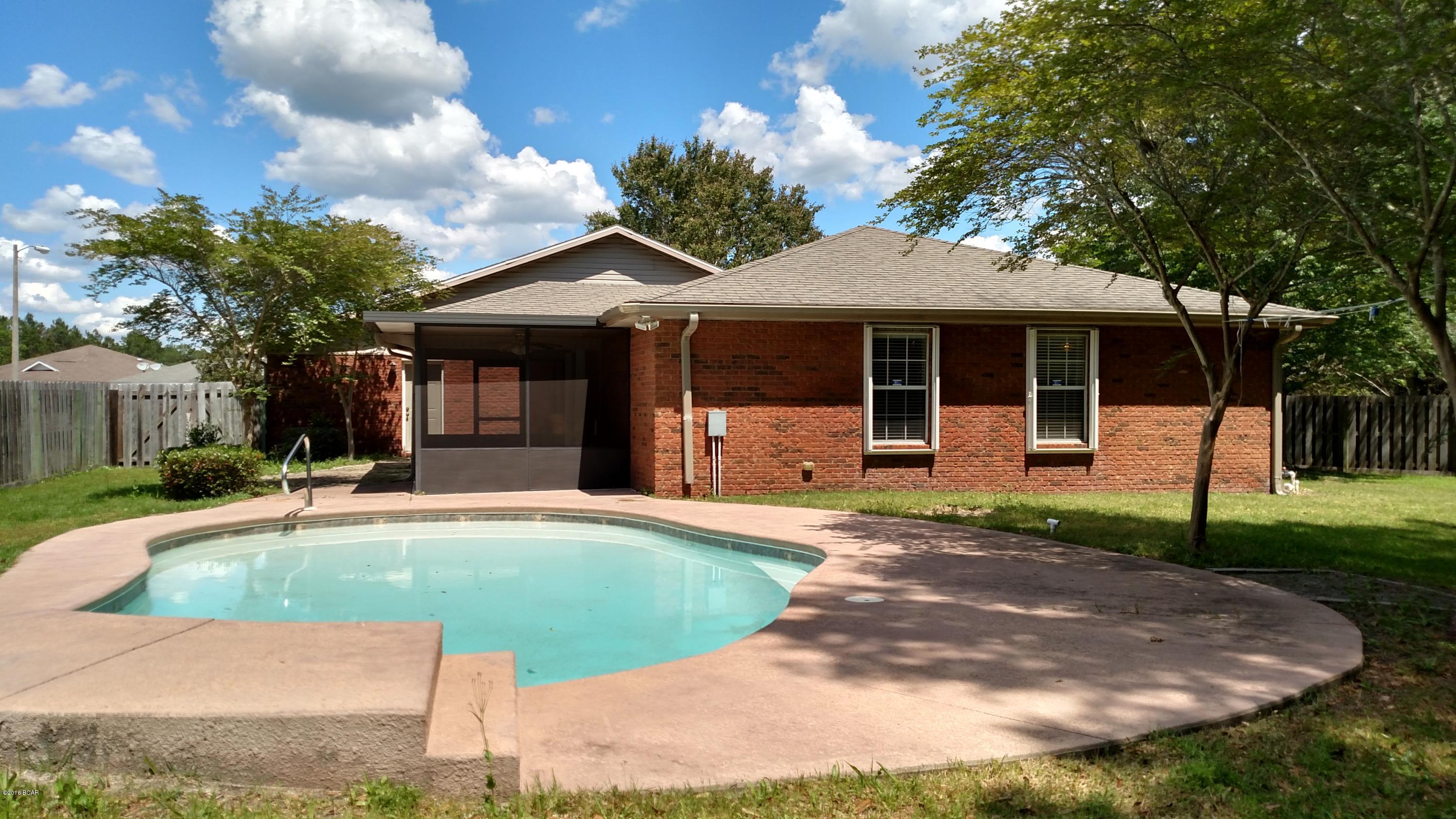 POOL HOME IN BRENTWOOD. This contemporary 3 bedroom, 2 bath brick home features a split bedroom floorplan. The spacious master bedroom has crown molding, dual vanity ensuite and walk in closet. Kitchen has nice cabinets with glass doors, Corian countertops, and stainless steel appliances. Laundry room has front loading washer and dryer included. The backyard is fenced with inground pool and large enclosed patio. Tenant has access to 2 yard buildings as well, one with power which would make a great workshop. This house is close to Tyndall Air Force Base, shopping, restaurants, hospitals, and just a short drive to the beautiful beaches! Pets allowed with approval and non-refundable pet fee. Smoking is prohibited. Rent includes monthly yard and pool service.