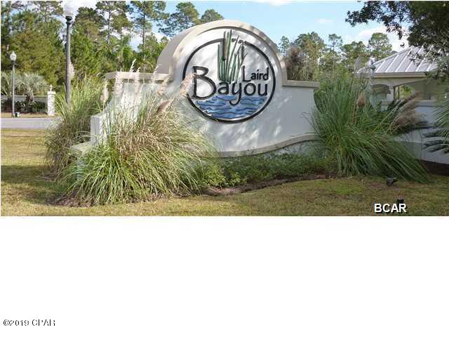 Build your dream home on this beautiful waterfront lot in the gated community of Laird Bayou. Flood insurance is not required! Laird Bayou boasts a peaceful, scenic, natural environment with deep water access to East Bay and the Gulf of Mexico from the community boat launch as well as a dock, community pool and fenced storage area for boats/RV's. This is one of the largest lots available with 1.4 acres.
