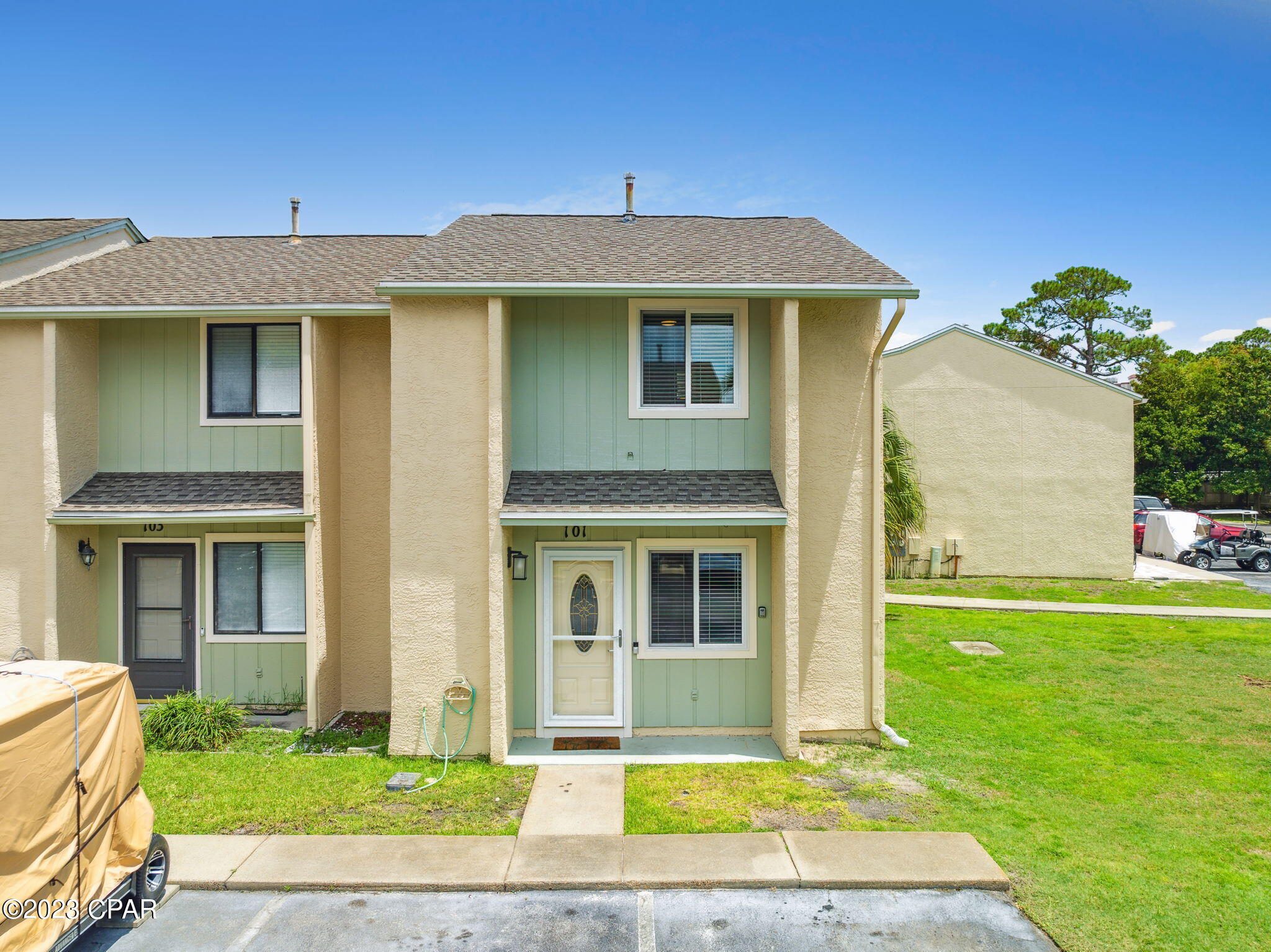 Welcome to Gulf Highlands! Endless amenities, beach access, and central Panama City Beach location. END UNIT with additional side green space, one of the larger lots in Gulf Highlands! This townhome features 2 bedrooms, 2.5 baths, 2 outdoor living spaces, a spacious living room, and a gas cooking range. The Gulf Highlands community is popular for its large list of amenities including tennis courts, shuffleboard, pickleball courts, mini-golf, fitness room, private beach access, and 11 pools, including 1 beachfront pool and 5 heated pools. This townhome is located directly by the shuffleboards and one of the heated pools. Buyer to verify any information deemed important. All measurements, information, etc is approximate.