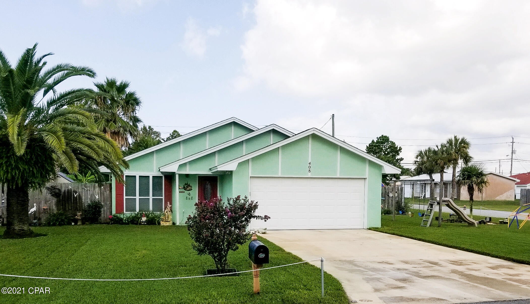 Immaculate and move-in ready home just a few blocks from the beach!  This 3 bedroom, 2 bath Bahama Beach home has a 3 year old roof,  new ceramic ''wood look''  flooring throughout, and the interior was recently repainted.  There is a lovely screened porch off the back of the home and inside the privacy fenced backyard you'll find a cool barbecue pavilion where the grill master can show off his culinary skills without any weather delays!  The yard is beautifully landscaped and the home is nestled on a corner lot so you've got lots of room.  The home is not only close to the beach, but around the corner from a park and an elementary school, and less than 5 minutes drive to shopping, dining and more!  All info is approx and must be verified by Buyers if important.