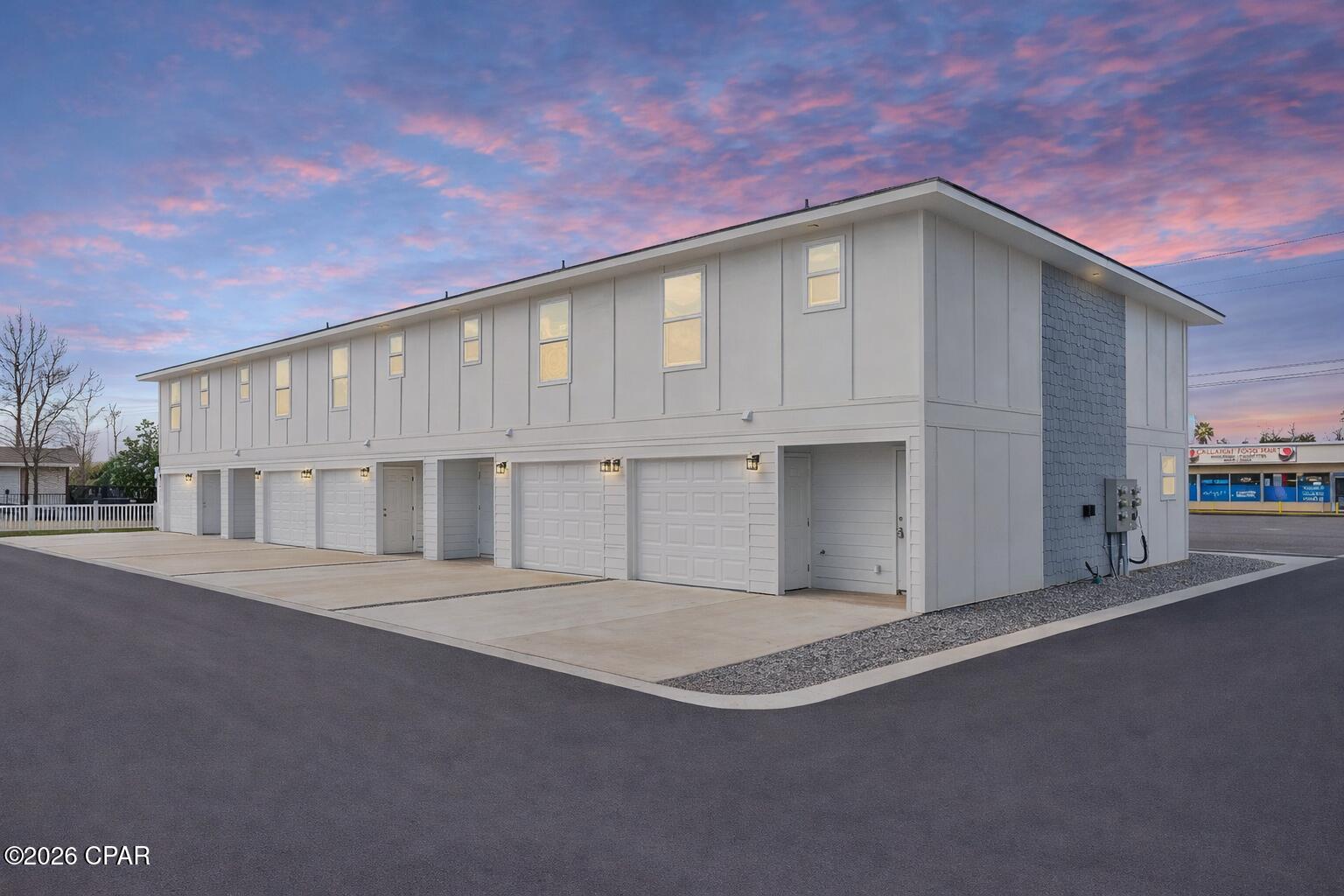 New Construction Townhome Convenient to Tyndall Air Force Base! Newly constructed two-story townhome featuring 3 bedrooms, 2.5 bathrooms, and approximately 1,300 square feet of heated and cooled living space, with an attached one-car garage.

 Community amenities include exterior maintenance and common area upkeep. As soon as you walk through the front door the entrance and grandeur of the entry hall is amazing with the tall ceilings and wide hallway! 

The main level offers an open-concept living, dining, and kitchen area with quartz countertops, stainless steel appliances, breakfast bar, and contemporary finishes.

 A half bathroom is located on the first floor for guest use. Rear access leads to a covered patio. 

Upstairs includes a primary bedroom is an absolute dream! Primary ensuite features a walk-in closet and built-in shelving, along with an ensuite bathroom featuring custom tile work and oversized gorgeous shower. Additional bedrooms, full bathroom, and washer/dryer connections are also located on the second level for convenience! Additional features include tall ceilings and modern construction standards. 

New construction may offer potential insurance and energy-efficiency advantages; buyers are encouraged to consult with their insurance and utility providers for specific details. 

The property is located approximately 6.6 miles from Tyndall Air Force Base, 1.6 miles from Winn-Dixie, and 2.9 miles from Under the Oaks Park, with convenient access to shopping, parks, and major roadways.

 Information is believed to be accurate but not guaranteed. Buyer to verify all measurements, features, and usage.