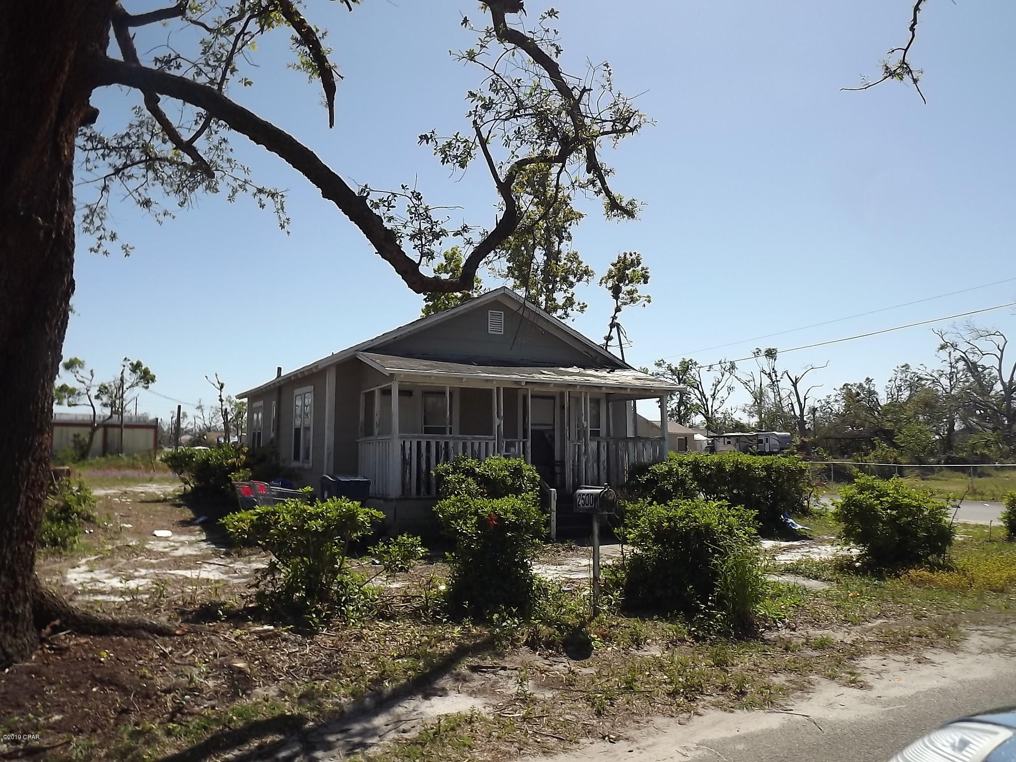 This is a Building Lot that can be split into two smaller lots.  At present there is a Structure on the property that may or may not be salvageable. Water, Electric and Sewer are available. Owner will consider Demo depending on Offer.  Check it out. Seller has multi-able Properties in this area that are also For Sale. OWNER FINANCING IS POSSIBLE.