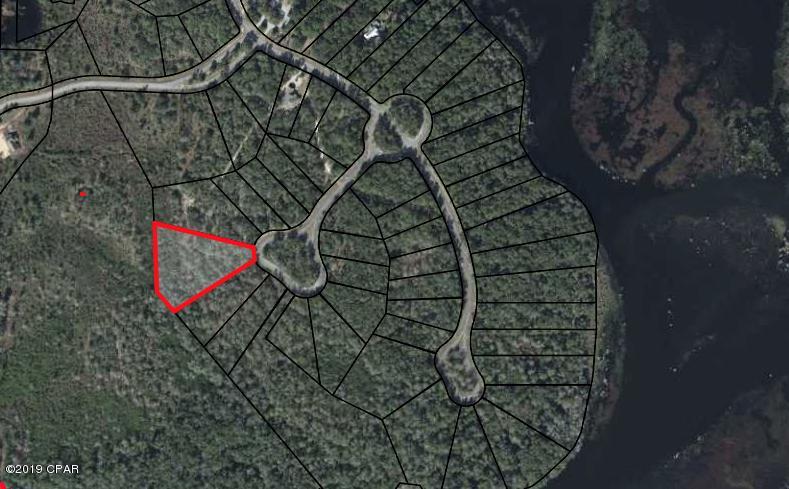 Here is your chance to build your dream home in one of Bay County's most exclusive gated neighborhoods.  Cedar Creek is in Southport, just 10-15 min north of Lynn Haven located on beautiful fresh water Deerpoint Lake.  This development is building out today with gorgeous high end homes, but you will also find all of the peace and quiet you are looking for in this beautiful wilderness.  Subdivision has pool, club house, play ground and lake access.  This lot is 2.25 Acres giving you plenty of room to build and still have privacy.  Located on a cul-de-sac.