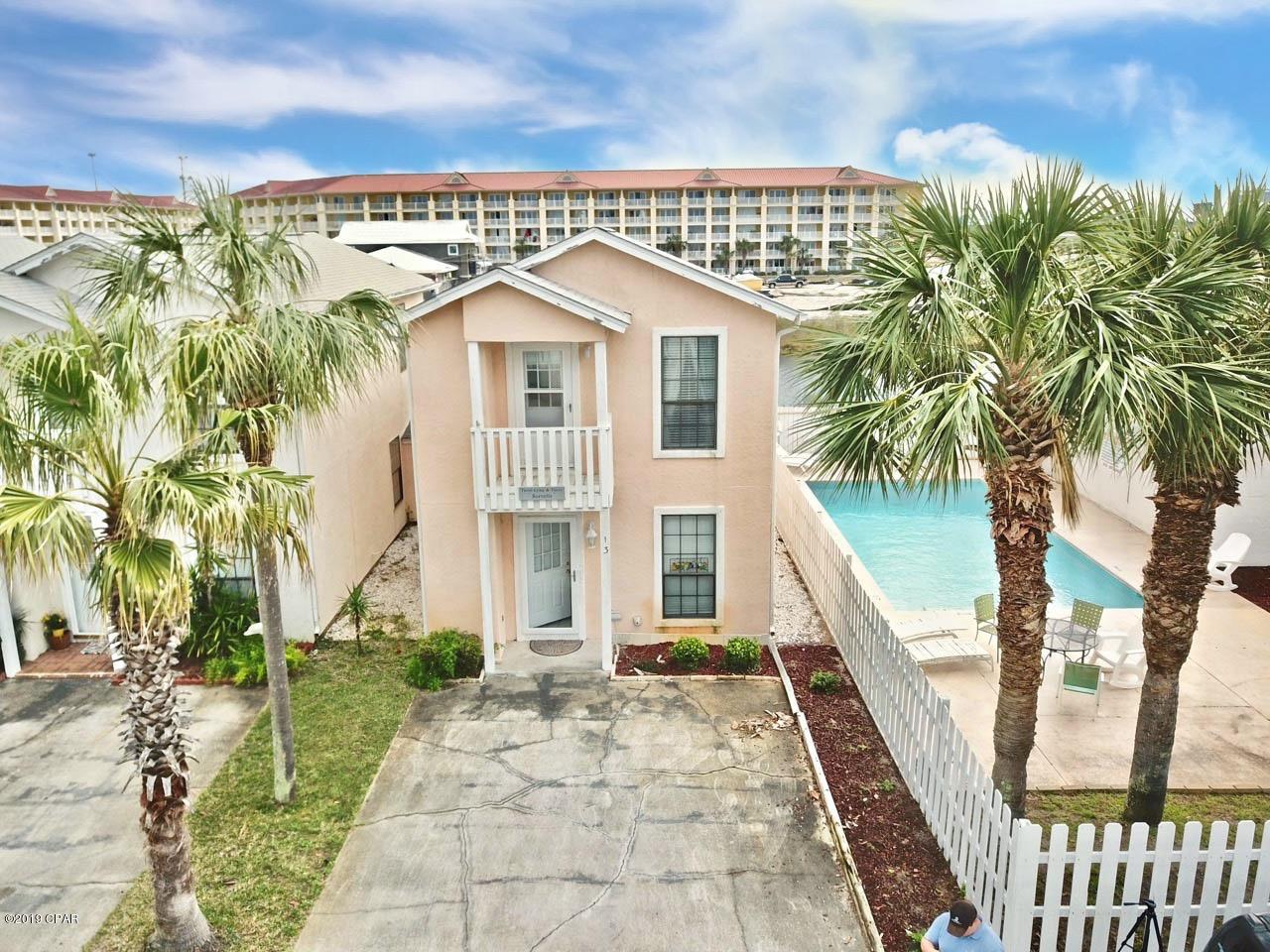 Step into an inviting paradise when you go inside this beautiful condo conveniently located just steps away from the sugar with sandy beaches of the gulf. Granite counter tops with mosaic tile back splash in the kitchen with beautiful tile floors in the kitchen and dining areas. private patio that is perfect for cookouts after a fun day on the beach. Located next to the community pool, this condo is perfect for vacation rentals. Furnishings are not included but seller willing to accept offers for the furniture separately.

Centrally located near Pier Park, Frank Brown Park and a host of great restaurants.