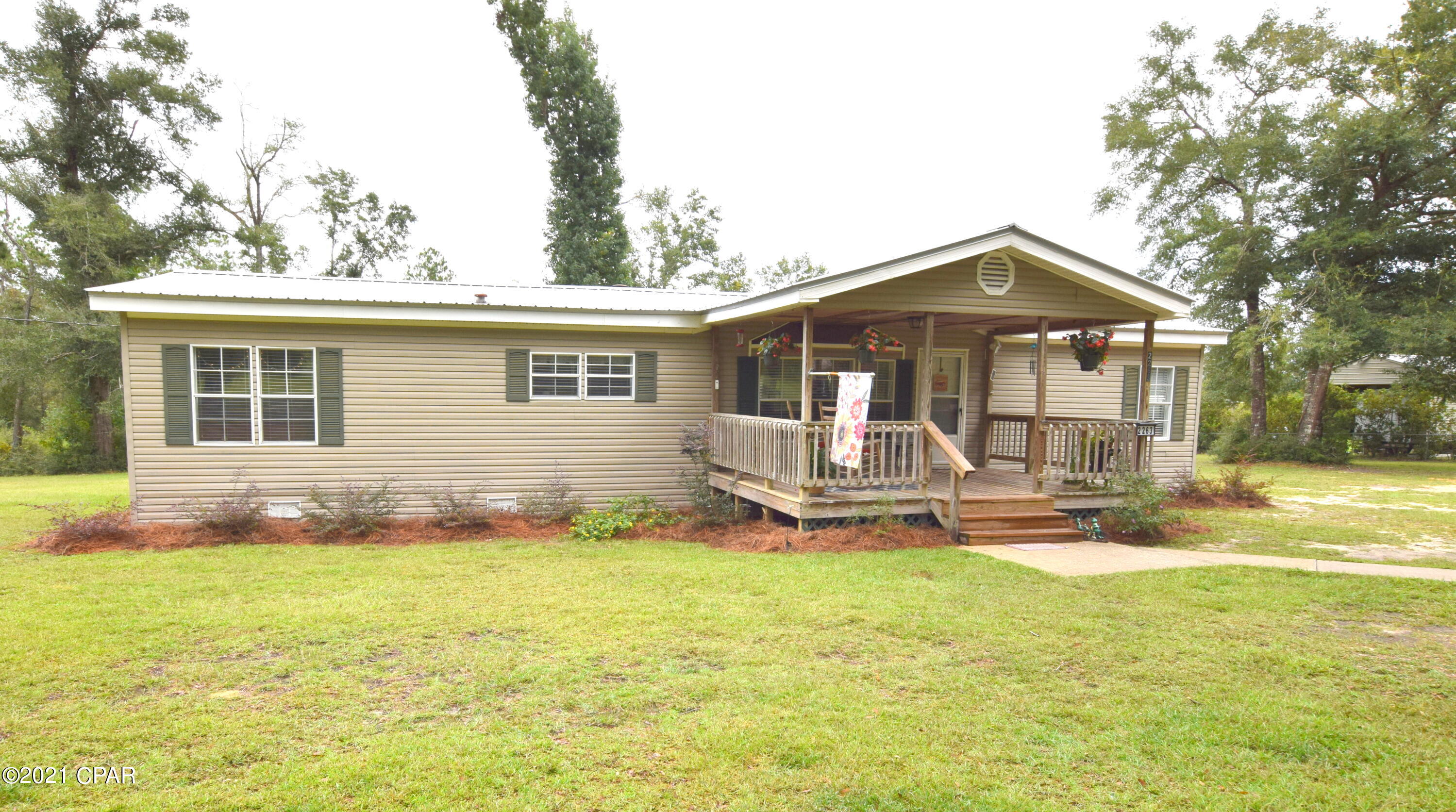 This recently renovated 3 bedroom, 2 bath home is peacefully located in a country setting on 4.95 acres and is awaiting its new owners. Walk inside and you are immedialty greeted with new Pergo flooring, a spacious living room with wood burning fireplace that is open to the kitchen boasting new stainless-steel appliances, custom pantry, and breakfast bar. The split floor plan provides privacy inside the master suite that features two closets, new tub/shower and double vanity. Outside you will find a covered front porch, newly constructed back porch, detached garage, portable storage shed and pole barn with lean-too. Home is located just off Orange Hill Rd and a short drive to Highway 77.