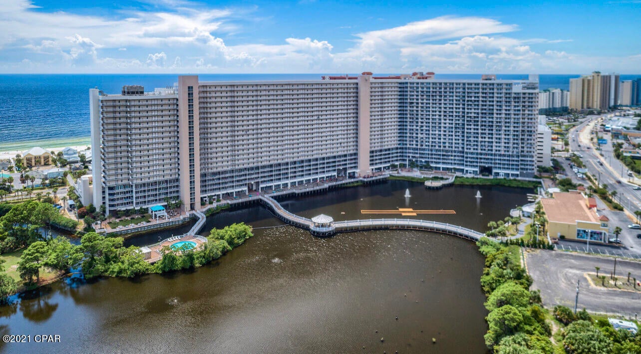 CURRENTLY UNDER CONTRACT, SELLER ACCEPTING BACKUP OFFERS.... Very Nice 4th Floor, lakeview, 1bedroom, 2 bath, with bunks at Laketown Wharf. Unit is in great shape and hardly used. Granite Counter tops, and hard wood cabinets. Nice tile in hallways, with carpet in the main living areas. Tile bathrooms, with nice granite topped vanities. King bed in master bedroom, and 2 twin bunks in bunk hall way with their dedicated bathroom. Like new washer and dryer (stacked) in laundry closet. Beautiful view of the lake, and no need for elevators, as this unit is right near the top floor of the parking garage!