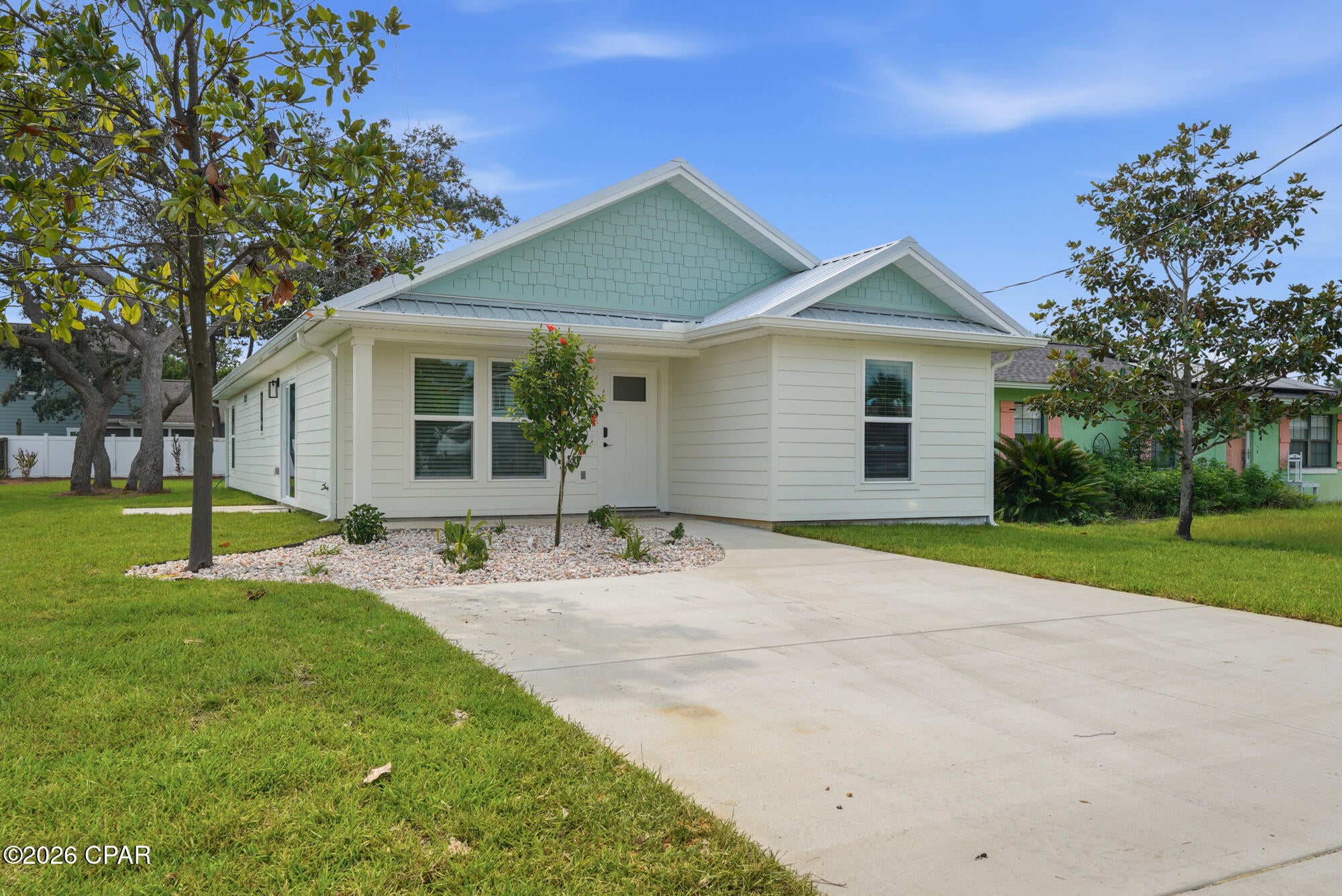 Construction complete! I am ready for showings :)
Most new construction gives you the same formula: a smaller lot, a builder-grade package, and neighbors close enough to borrow sugar without leaving the porch.

This home took a different approach.

Just 1.4 miles from the beach, this brand-new 4-bedroom, 3-bathroom home sits on an oversized homesite surrounded by beautiful mature trees--a combination that's becoming incredibly difficult to find. And perhaps the best part? The backyard still leaves room for your plans. Whether that's a detached garage, workshop, pool, outdoor kitchen, boat parking, or simply a place where kids and dogs can actually run, you won't be forced to choose.

Inside, every square foot works harder than its size suggests. The thoughtfully designed split floor plan creates true separation between bedrooms, making it equally comfortable for a growing family, visiting guests, multi-generational living, or a home office that doesn't take over the house. Storage wasn't treated as an afterthought either--with generous closets and practical spaces exactly where you'll appreciate them most.

 This home is engineered for up to 160 mph winds and built with a metal roof, impact-rated windows, and durable fiber-cement siding--the kind of upgrades that can mean lower insurance costs, improved energy efficiency, less maintenance, and the peace of mind that comes from knowing your home was built to last.

Proudly built by a small local builder, this isn't another production home rolling off an assembly line. It's the kind of home where the focus was on quality, smart design, and giving homeowners flexibility long after move-in day.