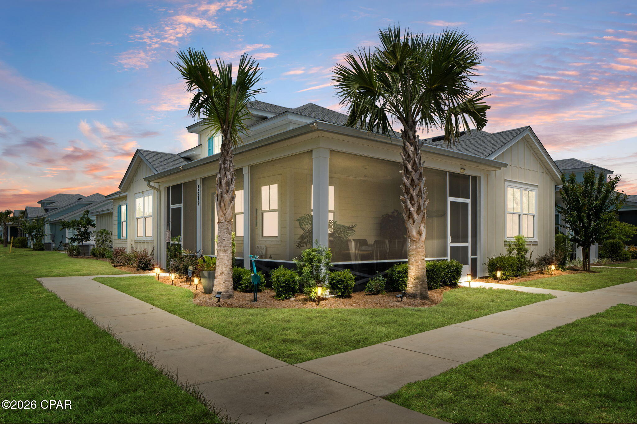 Experience the ultimate in coastal active adult living in Latitude Margaritaville Watersound, a premier 55+ community located just 7 miles from the sugar-white beaches of the Gulf Coast. This beautifully upgraded Dreamsicle Cottage is perfectly situated on a premium private preserve lot in the highly sought-after Phase 6BC, just steps from the popular Flip Flop Square, a neighborhood gathering space where residents enjoy social events and connecting with friends.

This light-filled home offers an open-concept floor plan designed for both everyday living and entertaining. The upgraded kitchen features quartz countertops, designer tile backsplash, upgraded white cabinetry with pull-out shelves, a gas range with griddle, and a shiplap-wrapped island. The adjacent dining area showcases a stunning shiplap feature wall, while the spacious family room boasts a soaring cathedral ceiling with decorative beams and an abundance of windows framing peaceful preserve views.

The private primary suite offers a relaxing retreat with a spacious walk-in closet and an upgraded ensuite bath featuring a tiled walk-in shower with frameless glass enclosure, upgraded vanity with quartz countertop, tile flooring, and blackout shade. The guest bedroom is conveniently located next to a beautifully upgraded full bath with tile flooring, quartz countertop, and upgraded cabinetry. French doors lead to a versatile den/office, ideal for working from home or accommodating additional overnight guests.

Enjoy Florida's outdoor lifestyle from the expansive wrap-around screened lanai, where you can relax while taking in the tranquil preserve setting.

Additional upgrades include RevWood by Mohawk laminate flooring throughout, crown molding throughout, designer lighting and ceiling fans, custom window treatments and blinds, designer interior paint, garage with coated flooring, upgraded garage door opener, hurricane shutters, and the balance of the 2/10-year structural warranty for added peace of mind.

Latitude Margaritaville Watersound offers an exceptional resort lifestyle with world-class amenities including a resort-style pool, state-of-the-art fitness center, tennis and pickleball courts, walking and biking trails, live entertainment, dining, clubs, social activities, and a vibrant calendar of events. Conveniently located near the new Publix-anchored commercial center, the new medical campus and hospital, shopping, dining, and just minutes from the Emerald Coast's beautiful beaches, this home offers the perfect combination of luxury, convenience, and the Latitude lifestyle.