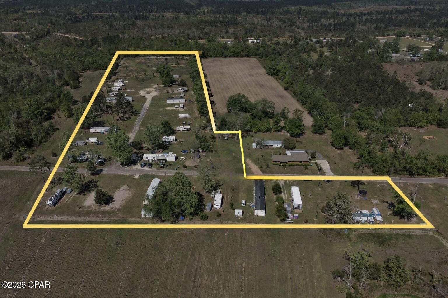 Income producing mobile home park offering 27 lots, 25 that are currently occupied on 10 acres. This established property provides consistent cash flow with significant upside potential through expansion or rent optimization. Ideal for investors seeking stable asset with value-add opportunities. Located in Marianna, FL with convenient access to major roadways, shopping, and local amenities. Opportunities like this don't last!