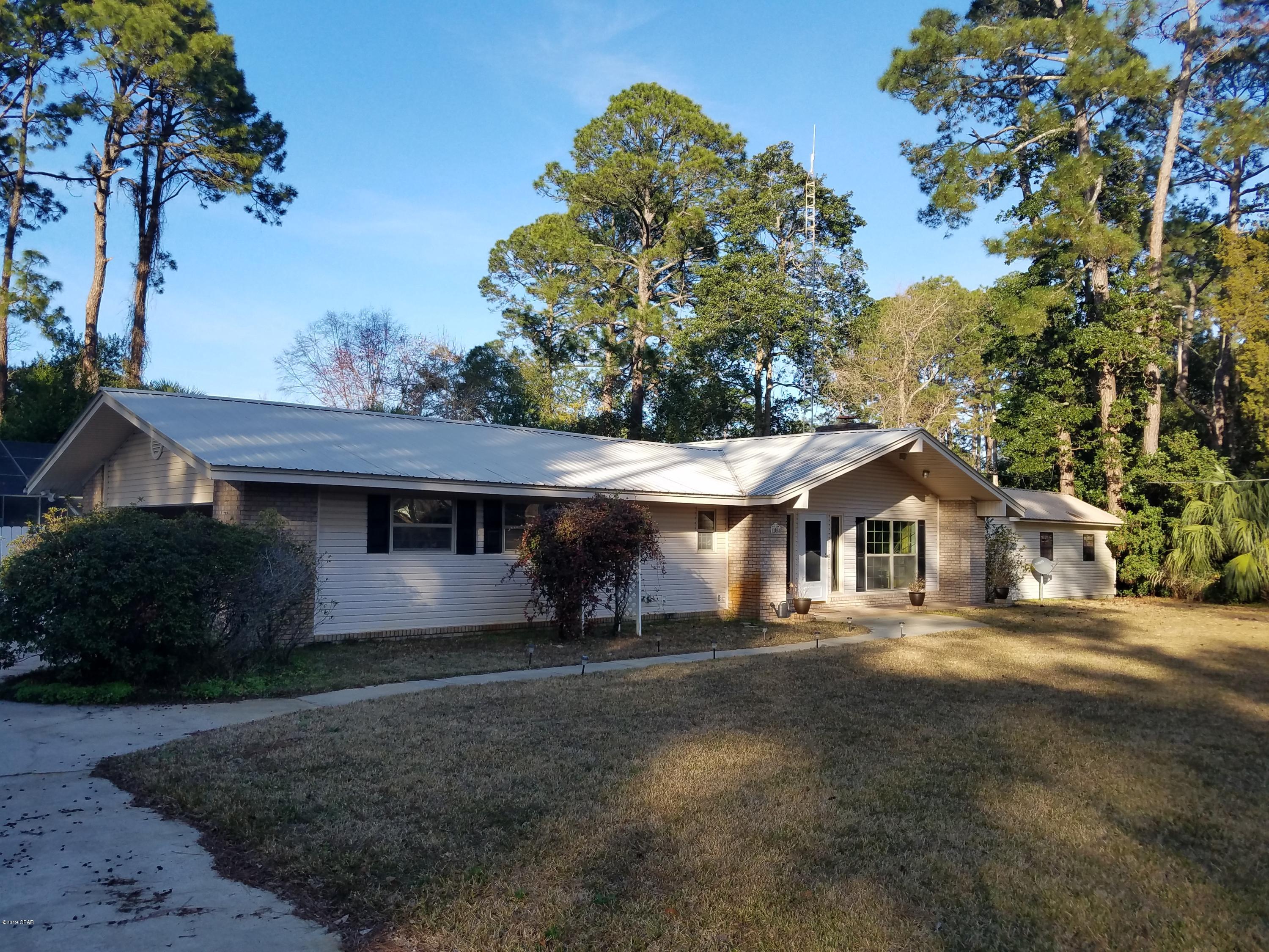 Located in St. Andrews, this home is situated on a spacious lot and offers tons of storage space. Exterior features include a pool, attached 2 car garage, a separate 2 car detached garage with workshop, and greenhouse. Interior features include a vaulted ceiling in the living and dining area, updated master bathroom, and Florida room. Rent includes pool service. Pet negotiable with $250 non-refundable pet fee.