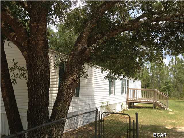 This 3 bedroom 2 bath mobile home is located in the quiet Green Acres Mobile Home Community, on a large lot of property. This home features an split bedroom floor plan to give extra privacy, and an eat-in-kitchen equipped with refrigerator, stove/oven. Central heat and air. Water, sewage, washer & dryer included. Come and experience quiet country living. Pets are negotiable with a non-refundable $150 per animal fee