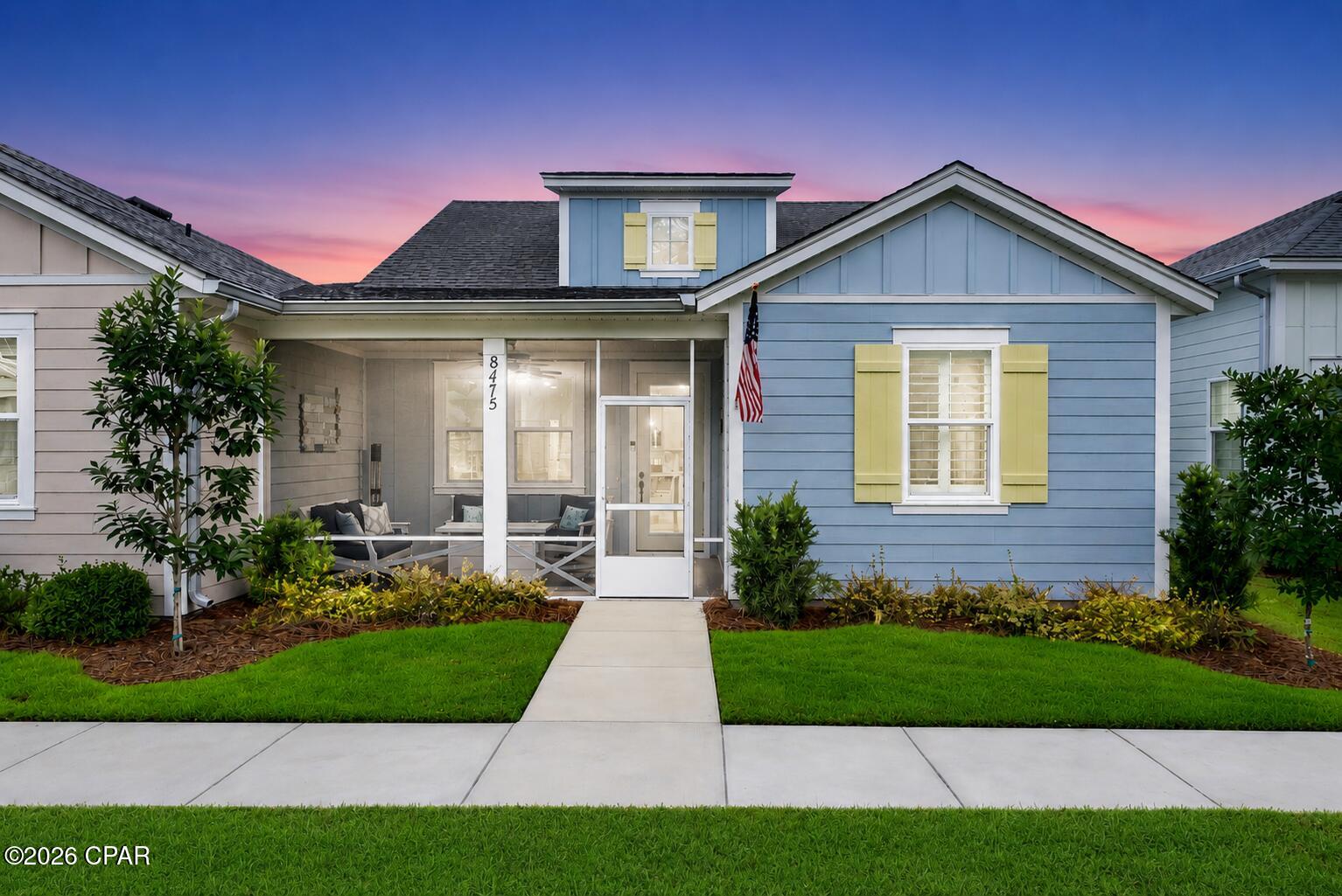 CAMELLIA - PHASE 5B - 8475 Dreams Float Court isn't just a home...it feels like a permanent vacation with a front porch made for morning coffee, sunrise conversations, and slowing life down just enough to enjoy it.

Welcome to this beautifully maintained CAMELLIA Cottage in Latitude Margaritaville Watersound, where comfort, style, and easy coastal living all come together. Perfectly positioned with a fantastic private lanai view and one of the best front porch experiences you'll find in the neighborhood, this home invites you to sit back, relax, and stay awhile. No blazing afternoon sun in your face here... just peaceful outdoor living, friendly neighbors, and plenty of great spots nearby for walking the pup or cruising the community by golf cart.

Inside, this thoughtfully upgraded cottage is move-in ready and beautifully decorated. The spacious primary suite features a king-size bed, generous closet space, and a beautifully designed ensuite bath complete with an upgraded glass shower enclosure. The secondary bedroom is currently set up as a functional office space featuring a custom Murphy cabinet bed. One of the coolest features is that the bed folds down while still allowing your laptop and workspace to remain in place, creating an instant guest room without disrupting your daily setup. The guest bedroom also includes a custom closet organizer for additional storage and functionality.

This home stands out with luxury vinyl flooring flowing seamlessly throughout the entire home... no carpet and no transitions, just one clean and consistent floor surface from room to room. Additional designer touches include plantation shutters, decorative molding, custom dining room shiplap, a stunning shiplap accent wall along the TV area, and matching shiplap wrapping the kitchen island to create a warm coastal feel throughout the living space. A custom decorative beam in the great room adds character and helps make this CAMELLIA truly one of a kind.

The kitchen is equally impressive with a natural gas stove, aftermarket backsplash, upgraded interior lighting, and plenty of space to entertain friends after a day at the pool, pickleball courts, or Town Square concerts. The laundry room features added cabinetry for extra storage and convenience.

Additional upgrades continue into the garage area with epoxy flooring, added gutters along the garage and side of the home, and extra attic flooring providing valuable storage space many cottages simply do not offer.

Many of the furnishings are negotiable with an acceptable offer, creating the potential for a seamless transition into your new Latitude Margaritaville lifestyle

The sellers love Latitude so much they're staying in the community and moving into a larger home, creating an incredible opportunity for the next owner. The sellers have already selected their next Latitude home and are ready for their next chapter, making this a fantastic opportunity for buyers looking for a quick and easy transition into the Latitude Margaritaville lifestyle.

Latitude Margaritaville Watersound offers resort-style amenities including the Paradise Pool, Fins Up! Fitness Center with indoor lap pool, pickleball and tennis courts, walking trails, a dog park, Last Mango Theater, Work & Play Center, on-site dining, live entertainment, and a vibrant social calendar that keeps the fun going year-round. The future commercial district being developed by The St. Joe Company along Highway 79 is expected to bring additional shopping, dining, and conveniences just outside the community gates.

Beautiful home. Beautiful phase. Beautiful lifestyle. Come see why so many people are falling in love with Latitude Margaritaville Watersound.  

Information is deemed reliable but not guaranteed. Buyers should independently verify all information, measurements, features, and any facts important to their purchase decision.