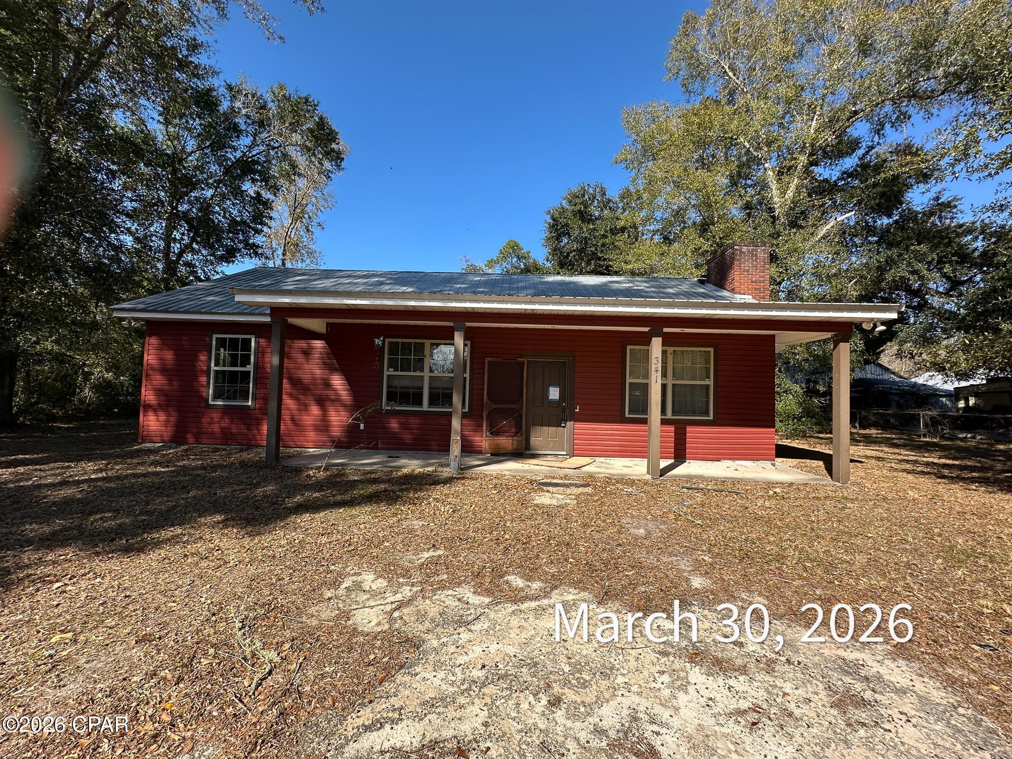 Opportunity awaits with this VA foreclosure in the peaceful community of Wewahitchka! Situated on 0.67 acres surrounded by mature trees, this 3-bedroom, 3-bath home offers 1,666 square feet of living space and the chance to make it your own.

Inside, you'll find a spacious open-concept living, dining, and kitchen area complete with a cozy fireplace, breakfast bar, and split-bedroom floor plan. The covered front porch provides the perfect spot to relax and enjoy the privacy of the large homesite.

This property needs some TLC but offers excellent potential for an investor, flipper, or buyer looking to build equity with renovations. With solid bones, a metal roof, generous lot size, and a desirable country setting, the possibilities are endless.

Conveniently located just a short drive to the Dead Lakes, rivers, and the Gulf Coast, you'll enjoy the best of North Florida's outdoor lifestyle while still being within reach of Panama City and Port St. Joe.

Property Highlights:

VA Foreclosure
3 Bedrooms | 3 Bathrooms
1,666 Sq. Ft.
0.67-Acre Lot
Open Living Area with Fireplace
Covered Front Porch
Metal Roof
Mature Trees & Private Setting
Great Investment or Renovation Opportunity

Property is being sold As-Is. Cash or renovation financing may be the best fit. Buyers should verify all information deemed important.