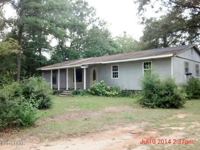 Home in the country sitting on 40 acres of beautiful land. Portions of property are cleared but has a lot of timber standing. Pond located on property. Home needs some repairs but is habitable at this time. Has two enclosed storage sheds. Beautiful, cleared field located beside home. All dimensions and information to be verified by Buyer. If you are looking for a quite home in the country, this is it.