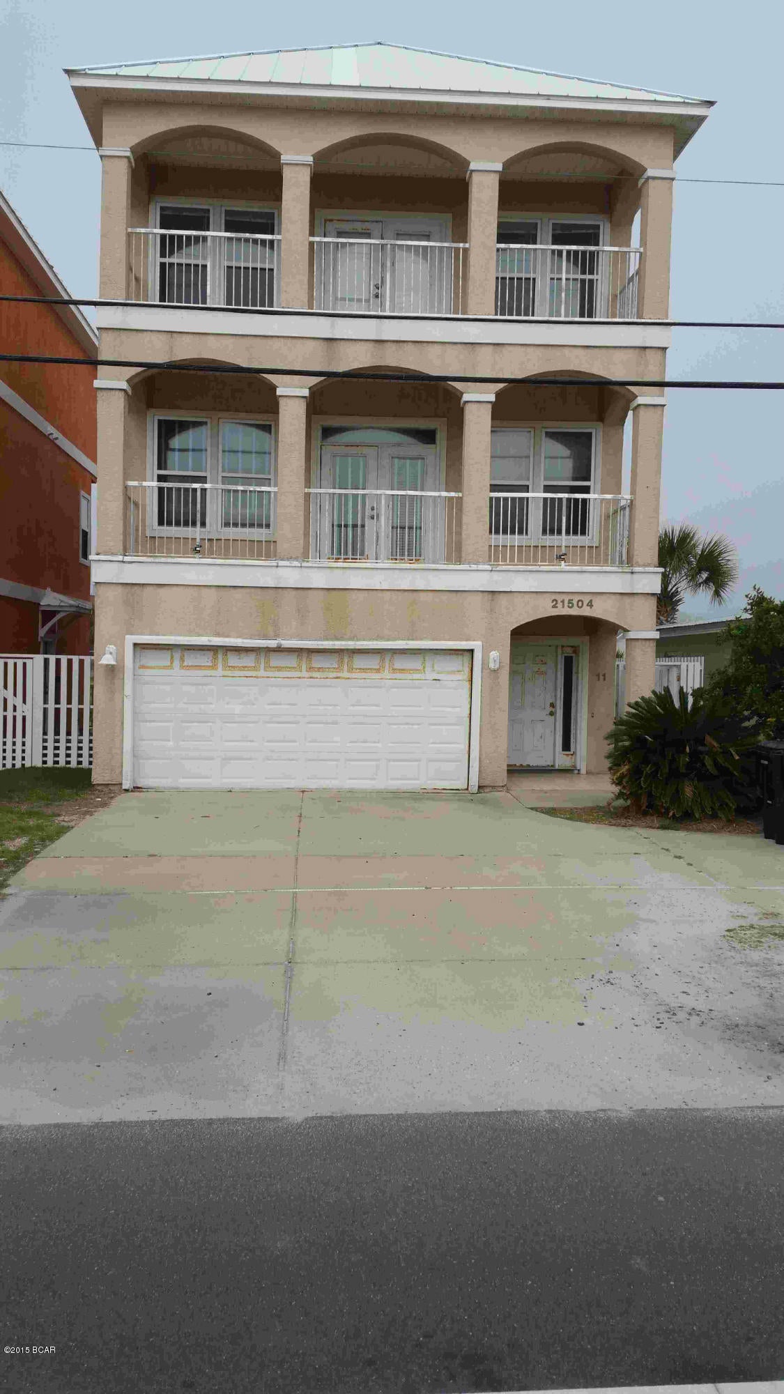 Investment Opportunity on 3 Story home overlooks Gulf of Mexico in front and Lake Riviera in  rear. Over 3100 total square feet under roof (2111  heat-cooled). Great Gulf views from 3rd floor and to the east on second floor. Every window has excellent view Gulf of Mexico or Lake Riviera. Fish the lake from your back deck or walk across street and fish Gulf of Mexico surf waters. House has many upgrades and features such as high ceilings, over 500 square feet of balcony spaces with panoramic views, double master shower, large master walk in closet, brass Moehn water fixtures. Riviera Beach Villas is an 11 villa resort with community swimming pool, club house, lake front commons area, deeded beach access, lawn maintenance and some utilities, low HOA fees. Needs work interior and exterior. Bank Owned Foreclosure that overlooks the Gulf of Mexico and dedicated beach to the front and is lake front to the rear on pristine Lake Riviera with over 
3,100 total square feet under roof. Great Gulf view from the 3rd floor and to the east on the second floor. Every window in this house has an excellent view of either the Gulf in front or the lake in the rear. Fish from your back deck in the lake or walk across the street and fish the Gulf of Mexico surf waters. House has many upgrades and features such as high ceilings, over 500 square feet of balcony spaces with panoramic views, double master shower, large master walk in closet, brass Moehn water fixtures. Riviera Beach Villas is an 11 villa resort with a community swimming pool, club house, lake front commons area and deeded beach access. Resort includes lawn maintenance and utilities with low fees.