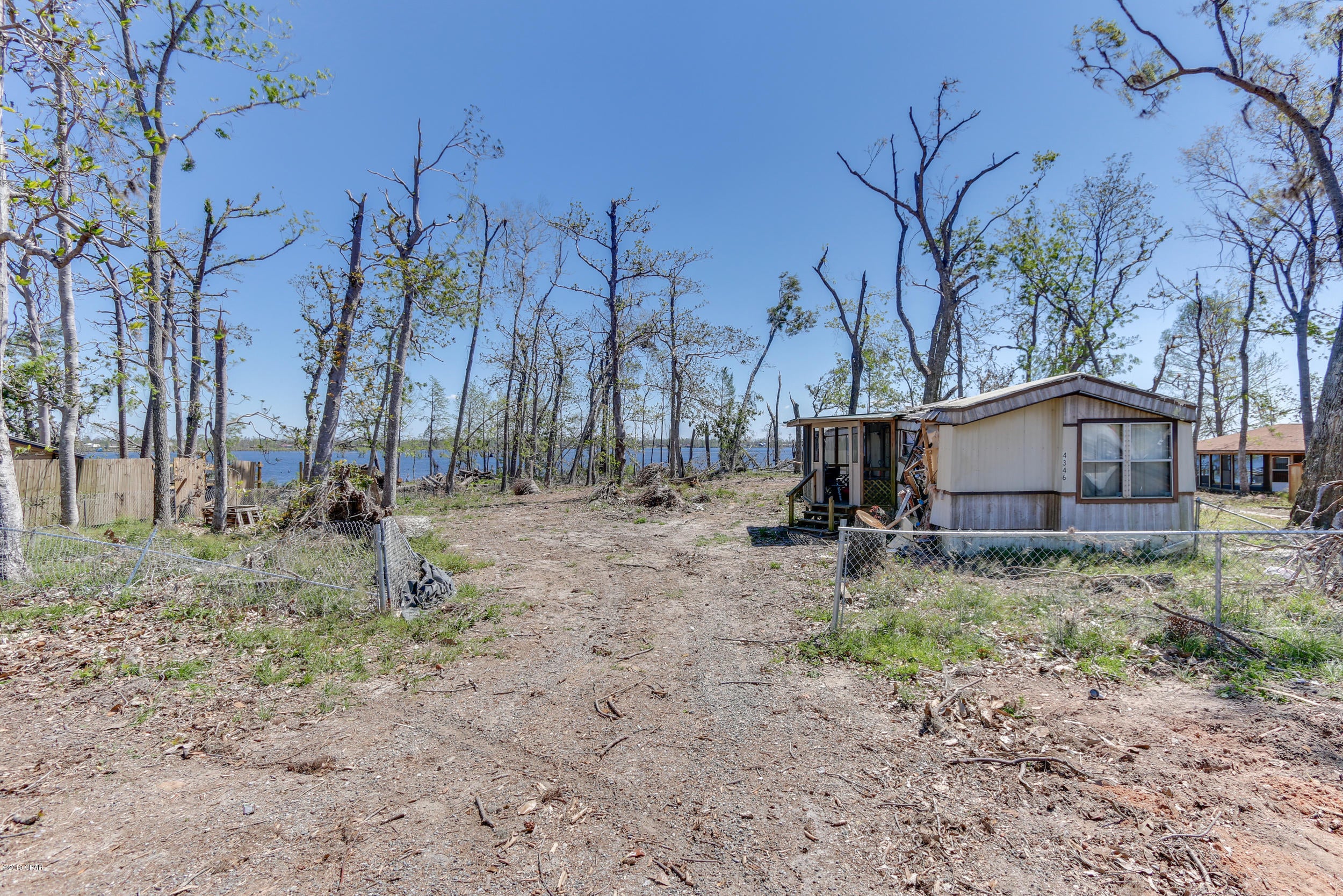 CURRENTLY UNDER CONTRACT with no Kick Out Clause, SELLER ACCEPTING BACKUP OFFERS



Don't miss this GREAT OPPORTUNITY to own LAKEFRONT property. This is almost an acre of land right on DEER POINT LAKE with over 200 feet of lake frontage. You will not find a better deal on lake front with this size lot or these great views. There is a mobile home and an additional building on the lot that were severely damaged during the hurricane. According to the seller the additional building is right on the lot line.  The A/C unit is encroaching on the other property. Check it out before it's too late. 4344 Huckleberry is occupied and also for sale. See MLS#681876 for details. Purchase both and you will have over an acre of land and over 285 lake frontage on the beautiful Deer Point Lake.