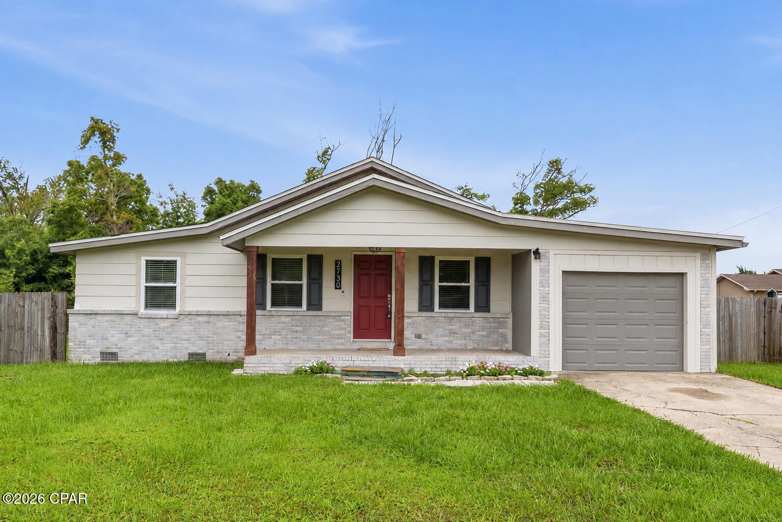 Price Improvement! Opportunity awaits with this 4-bedroom, 2-bath home conveniently located in the heart of Panama City! Offering 1,281 square feet of living space, this property features an open semi-split floor plan, vinyl plank flooring, abundant natural light, and an interior laundry room. The kitchen includes newer cabinetry, quartz countertops, stainless steel appliances, a breakfast bar, and a buffet-style serving area with open shelving.

The primary suite offers a walk-in closet with built-in shelving and an adjoining bath with a large walk-in shower. Outside, you'll find a welcoming front porch and a spacious fenced backyard with plenty of room for outdoor enjoyment.

This property is being sold AS IS. Whether you're an investor, flipper, or buyer looking to renovate and build equity, this home offers excellent potential in a central location. Situated in an X Flood Zone with no HOA. Measurements are approximate. Some photos may be virtually staged or digitally enhanced. Buyers should verify all property features, measurements, and conditions in person.