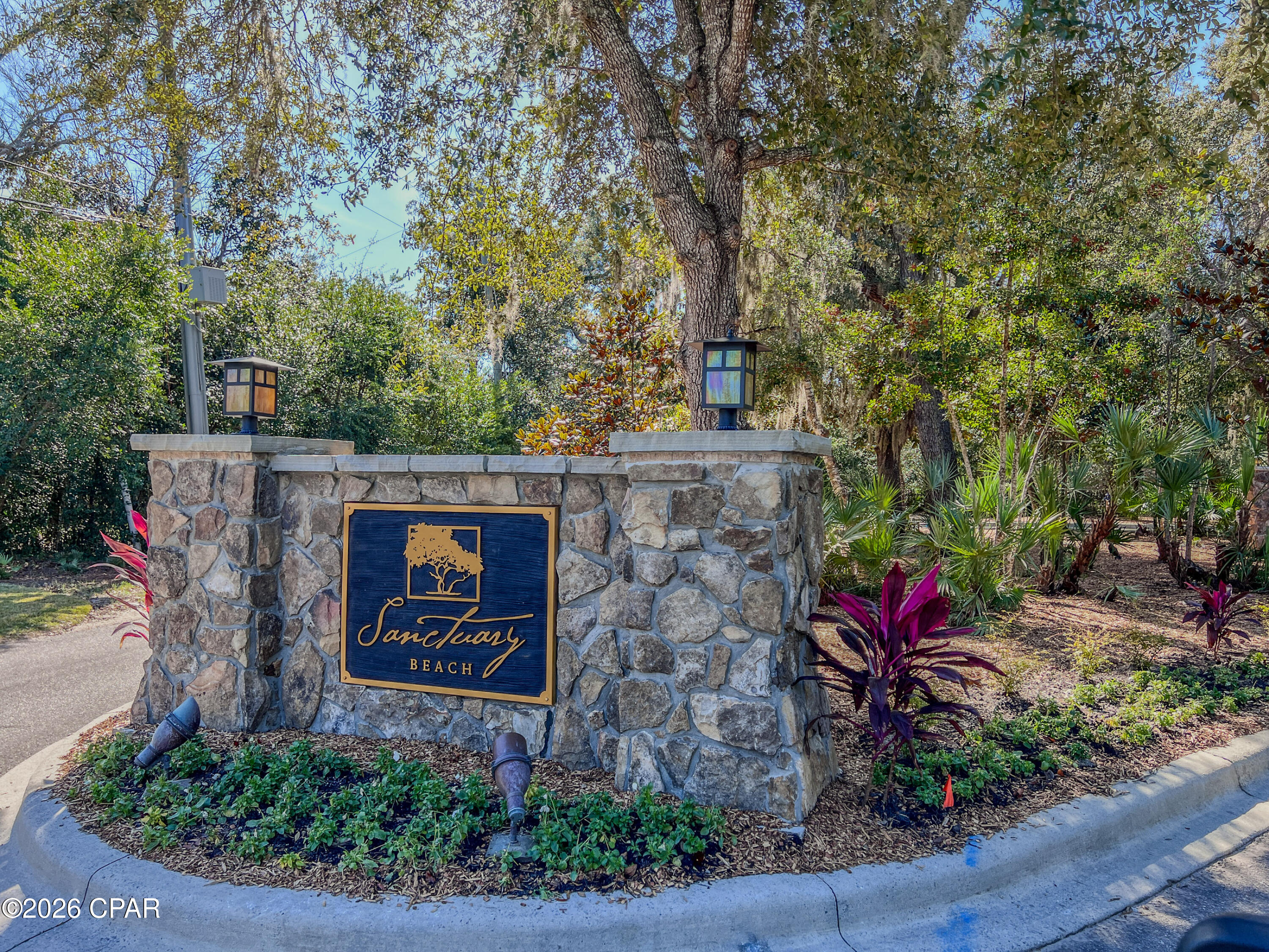 Discover an exceptional opportunity to build your custom home in Sanctuary Beach, a serene, gated community surrounded by mature trees and natural beauty. This residential lot offers a peaceful setting and a blank canvas for a thoughtfully designed coastal home within a neighborhood that truly feels like a sanctuary. Residents enjoy a community pool and the unique convenience of a peaceful public bay beach located just outside the neighborhood gate--ideal for kayaking, paddleboarding, or enjoying sunrises over the bay.

Sanctuary Beach is a small, low-density community known for its golf cart-friendly streets and tranquil atmosphere, where deer and native birds are often seen throughout the neighborhood. The lot is positioned with Bay Point Golf Course across the street, providing open views and the added benefit of no future construction directly in front of the property.

Convenient to nearby marinas, waterfront dining, and everyday amenities, Sanctuary Beach is well suited for both a primary residence or a second home. Don't miss the chance to create your own coastal retreat in one of the area's most peaceful settings.