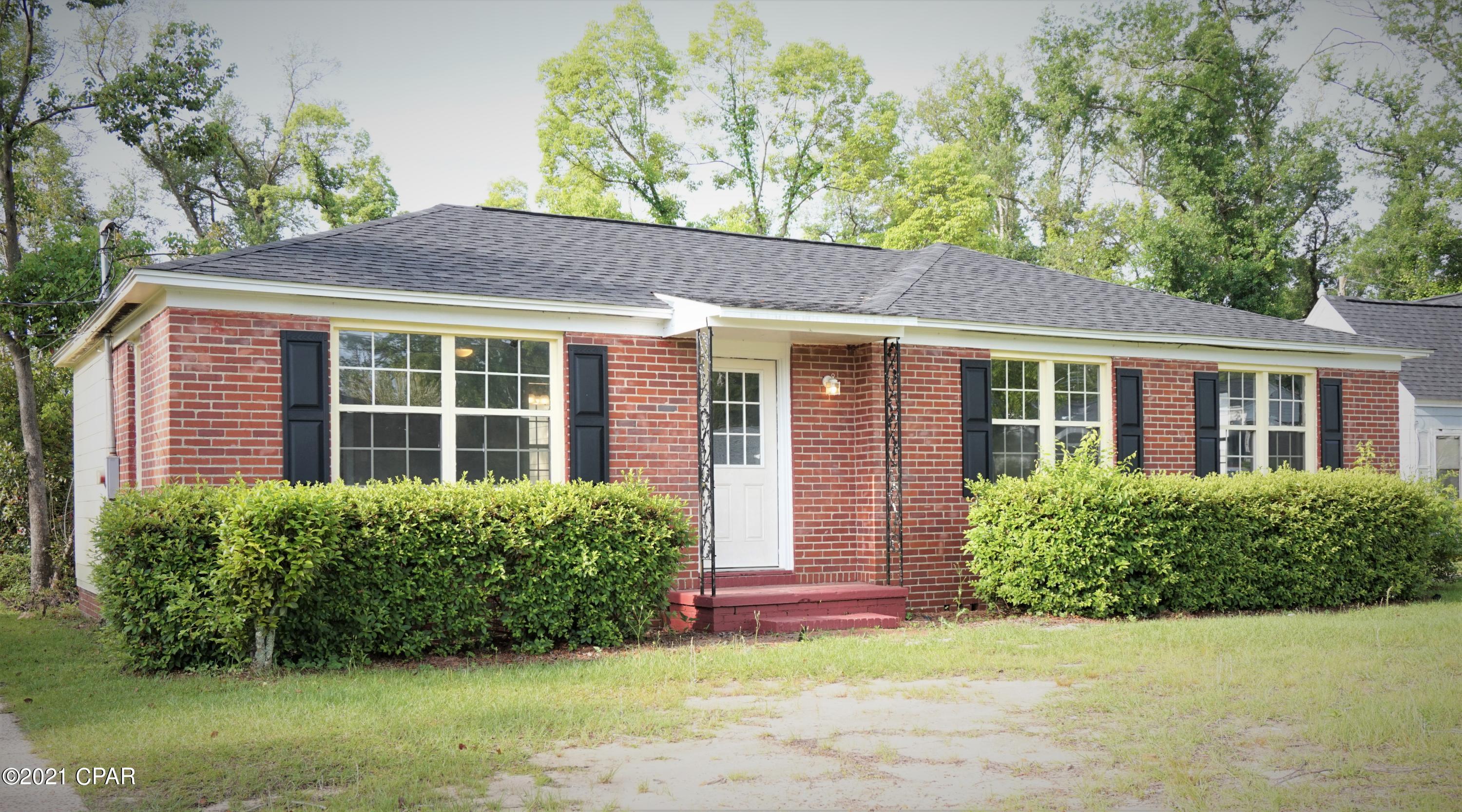 'CURRENTLY UNDER CONTRACT, SELLER ACCEPTING BACKUP OFFERS' This renovated 4 bedroom/2 bathroom home is located in the heart of Marianna. Updates include new windows, HVAC, water heater, and roof. Upon entering the home, there is a large living area complete with a small attached room that could be used as a mud room or play room. Just off the living area is the dining room which opens up into the kitchen that features granite countertops and stainless steel appliances. Located off the kitchen is a laundry room & a large master bedroom & bathroom.  A long hallway off of the living room leads to 3 bedrooms & 1 full bath. Beautifully restored hardwood floors can be found throughout most of the home. This mostly brick home is located on a large lot perfect for outdoor activities. Home has sh