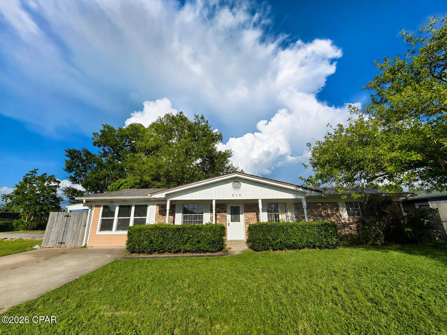 Welcome to 215 S. Kimbrel Avenue, a spacious 3-bedroom, 2-bathroom home offering approximately 1,568 square feet of comfortable living space in Panama City.

Inside, the home features a generously sized living room with abundant natural light and durable flooring. The kitchen provides ample cabinet and counter space, full-size appliances, and a curved breakfast bar that opens to the dining area. An additional built-in worktable and cabinetry give the dining area useful everyday flexibility.

Three bedrooms offer practical layouts, and the home includes two full bathrooms--one with a tub-and-shower combination and another with a tiled shower. The large enclosed sunroom is lined with windows and creates excellent extra space for relaxing, hobbies, a home office, or an additional sitting area.

The separate laundry and utility area includes washer and dryer connections, shelving, and additional storage. Outside, enjoy a fenced backyard, mature shade trees, and a convenient side patio.

Schedule your showing today and see the space and flexibility this Panama City home has to offer.