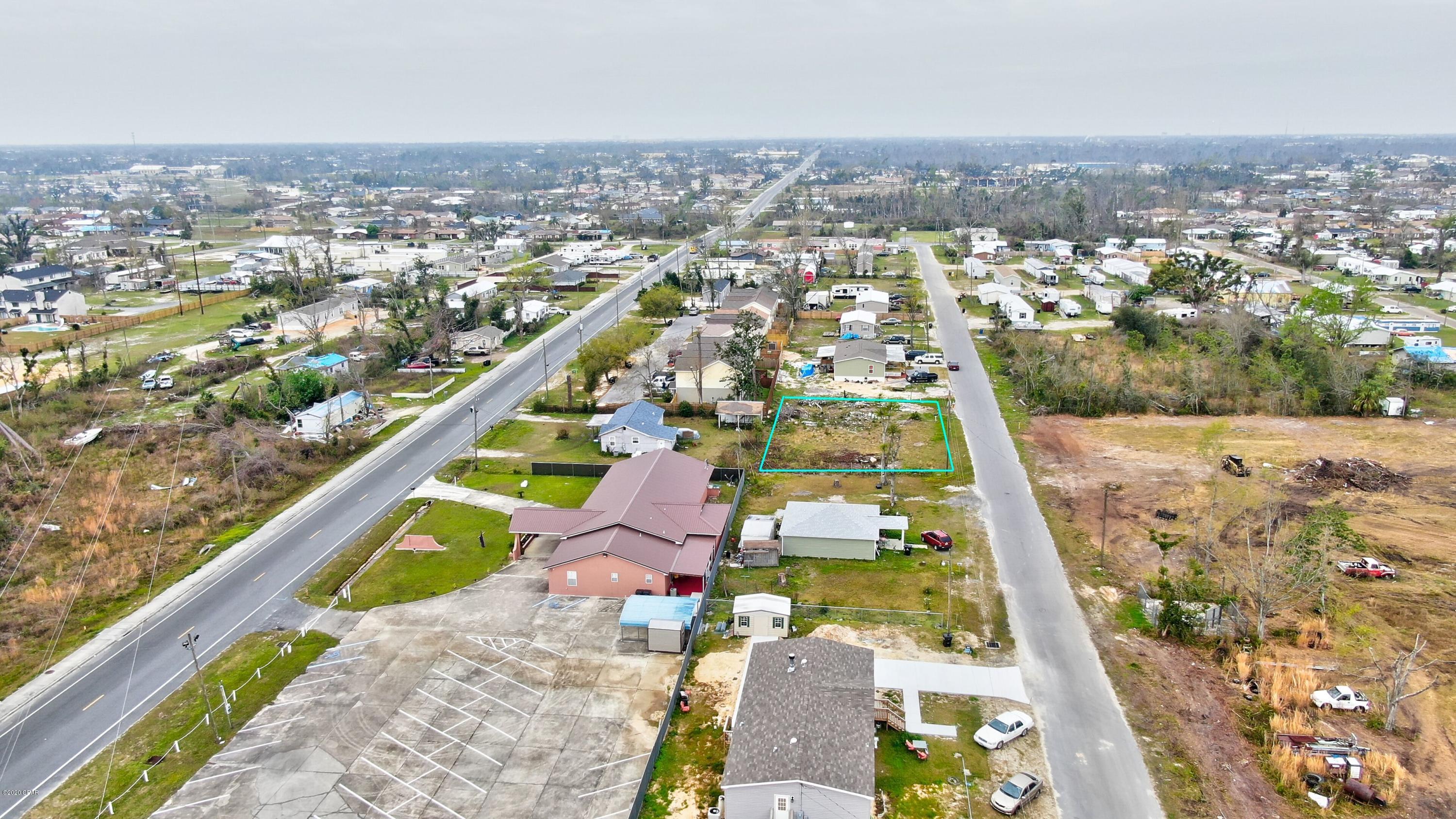 Vacant lot just off Tyndall Parkway!  Very wide lot with 135 ft of frontage on 11th ct. There was a mobile home on this lot but it has been torn down and cleared away. Seller has another lot for sale at 2314 1/2 13th St E, for 30k. Seller is open to a bundle deal for the two lots, and will entertain an offer of 60k for both.** All measurements listed are approximate and are taken from the property appraiser's site. If important, please verify.**