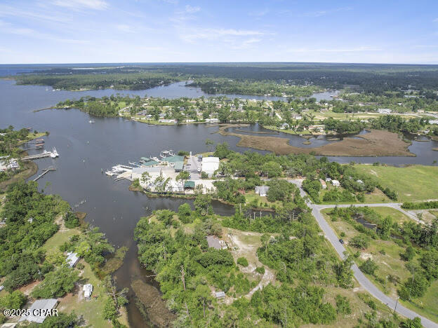 Prime opportunity on Fanning Bayou! This beautiful property offers endless potential, perfect for investors, ideal for developers( Could be Bay Counties next waterfront community), and fantastic location for a business venture. With excellent access to Highway 77, this property combines waterfront appeal with high traffic visibility. Whether you're planning a thriving business or a thoughtfully developed neighborhood, the location can't be beat! This property is zoned C-1 Neighborhood commercial with deep water access! All measurements are approximate and should be verified by buyer.