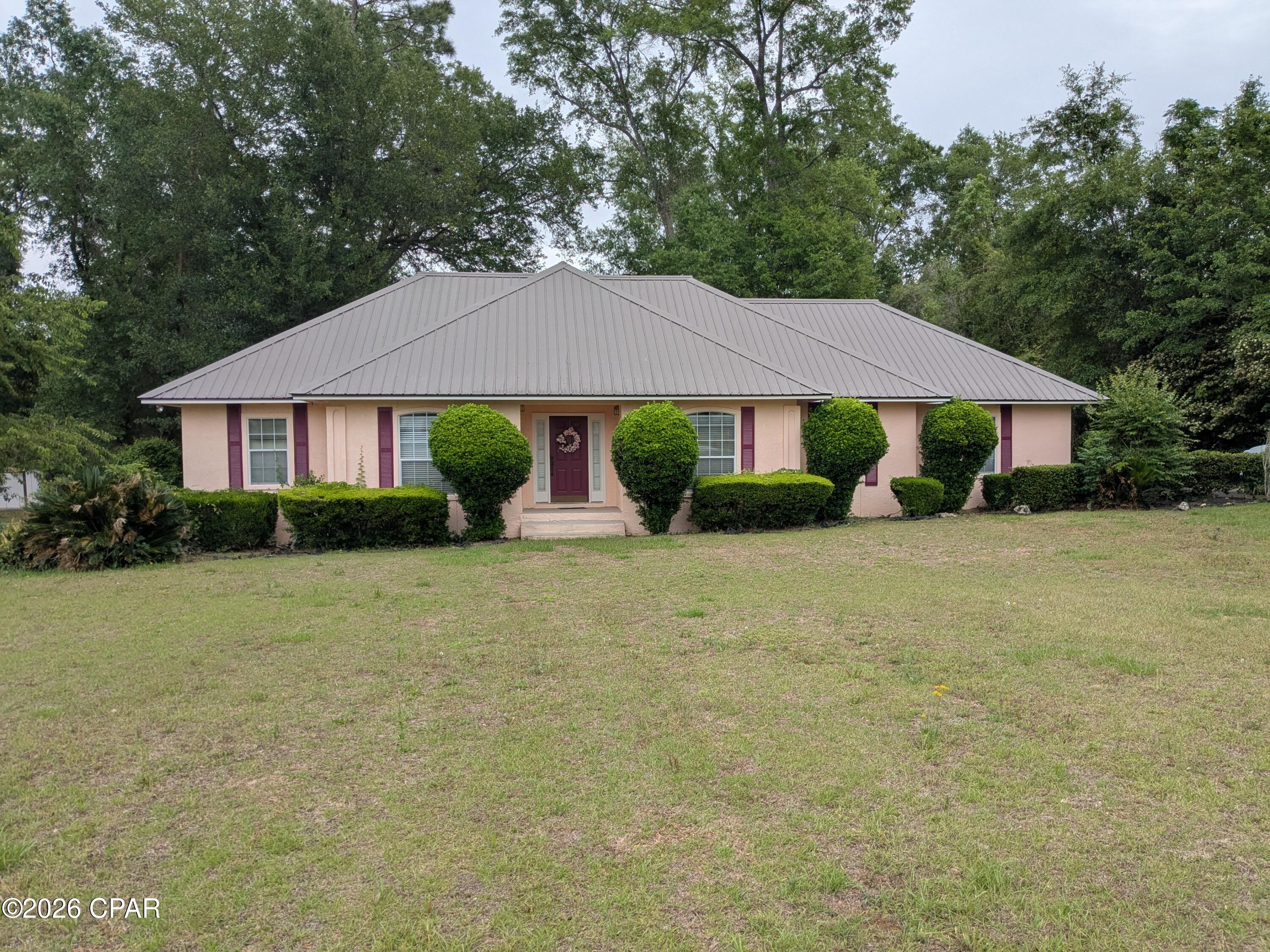 Very nice home located in Oaks Subdivision
North of Marianna off the Caverns Road.
Home has 3 spacious Bdrm's and 2 Baths.
Kitchen has new stainless steel appliances and home has new flooring throughout most of the house. The back deck is very large with lots of room for grilling out or relaxing under the trees overlooking the back yard. 
Home has annual renewable termite bond and new roof completed in 2020. Home has springler system in the very large front yard. Don't miss out on this one,