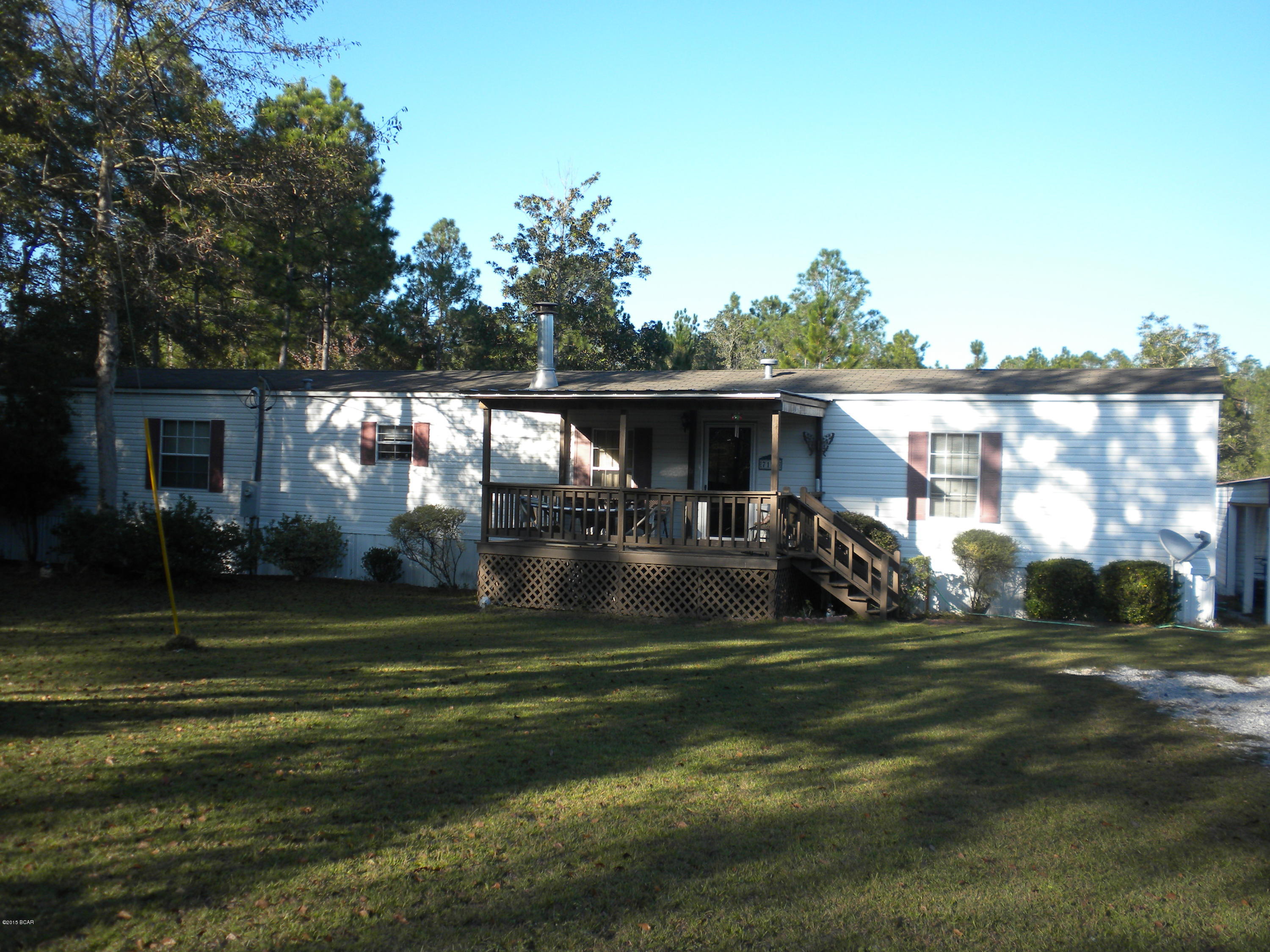 COUNTRY LIVING IS EASY IN THIS VERY CLEAN AND NEAT 16 X 80 MOBILE HOME  WITH LARGE BUILT ON COVERED PORCH ON A 1+ ACRE PRIVATE LOT, BACK YARD IS PARTIALLY FENCED BACK YARD FOR THE KIDS OR YOUR PETS. THIS NICE HOME HAS SPLIT BEDROOM PLAN WITH 2 NICE SIZE BEDROOMS AND BATH AT ONE END AND THE OVER SIZED MASTER BED AND BATH WITH GARDEN TUB, SEPARATE WALK IN SHOWER  AND  A LARGE WALKIN CLOSET. LIVING ROOM WITH FIREPLACE FLOWS INTO THE KITCHEN IN THIS SPACIOUS OPEN FLOOR PLAN. THERES A LARGE COVERED 2 CAR CARPORT AND A METAL STORAGE BUILDING.  CALL TODAY TO SEE THIS HOME