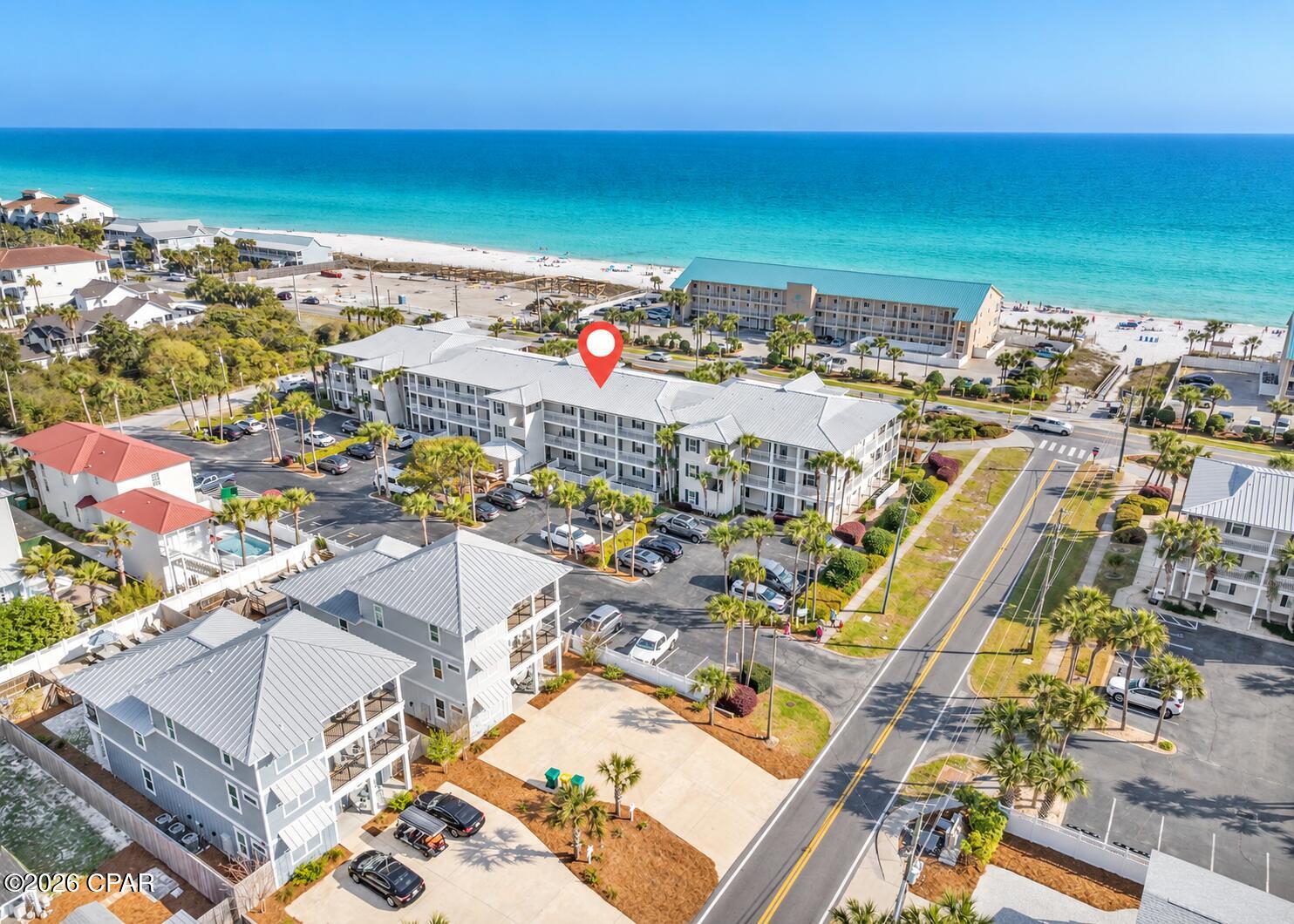 Welcome to Grand Caribbean East Unit 109 -- a ground-floor gem in Destin's coveted Crystal Beach neighborhood with up to $58K in projected annual rental income -- rental projection report available upon request. Skip the stairs and step directly from your private patio onto the pool deck, where the pool, hot tub, and grilling area are just steps away -- an effortless experience that owners and rental guests absolutely love. Built-in bunk beds maximize sleeping capacity, a key driver of short-term rental performance. Grand Caribbean East is a low-density, three-story complex offering a relaxed, intimate coastal atmosphere compared to the larger resort-style properties along the Emerald Coast. When the beach calls, it's just a short walk across the street to Pompano Beach Access or the expanding Tarpon Beach Access -- which will soon include added parking, restrooms, and a park area, a long-term value enhancer for the entire neighborhood. Fully furnished and short-term rental allowed -- Unit 109 is truly turnkey. Whether you're seeking a personal Gulf Coast retreat or a high-performing investment property, this unit delivers the ideal combination of location, access, income potential, and effortless coastal living.