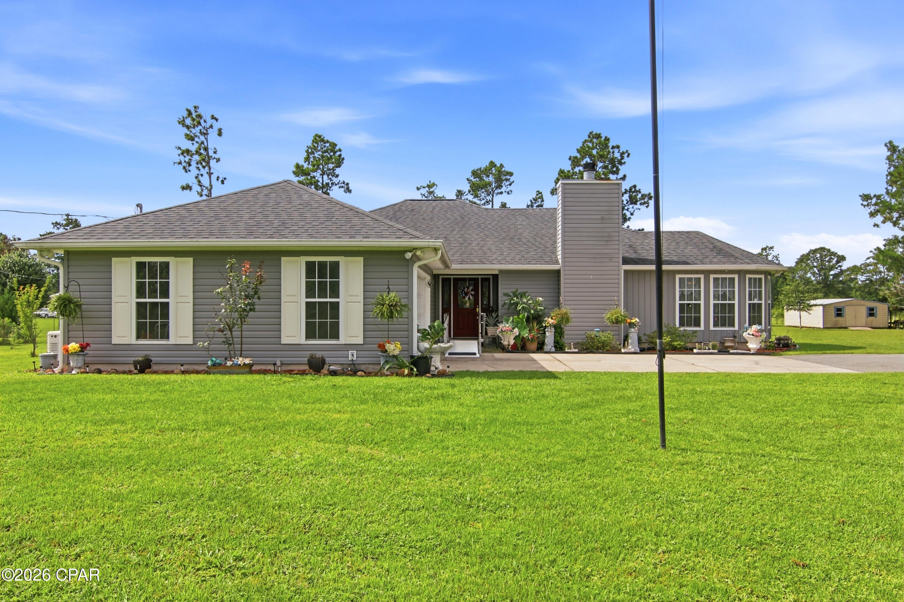 5 Acres, Pool, Whole-Home Generator, Chicken Coop & No HOA!

Enjoy space, privacy, and country living at 11916 Owenwood Road in Fountain, Florida. Situated on 5 acres, this 3-bedroom, 2-bath home offers plenty of room to spread out, entertain, garden, and enjoy the outdoors--all with NO HOA.

One of the standout features is the screen-enclosed swimming pool, creating your own private backyard retreat. A new pool pump and filter add peace of mind and make it ready to enjoy. Inside, the home offers comfortable living spaces, including a formal living room with a fireplace that adds warmth and character.

Several major improvements have already been taken care of, including a new 16 SEER HVAC system and new water heater, both installed in 2025. A whole-home generator provides added security during power outages, while an installed security system offers another layer of convenience and peace of mind.

Outside is where this property truly shines. The 5-acre setting features numerous established fruit trees, giving the property a wonderful country feel. Dreaming of fresh eggs and a small homestead lifestyle? The property is already set up for chickens with an existing chicken coop and run. A storage shed provides additional space for lawn equipment, tools, and outdoor gear.

Whether you're looking for more room, a place to enjoy outdoor living, or simply the freedom that comes with acreage and no HOA restrictions, this property offers a combination that's increasingly hard to find. Come experience the space, privacy, pool, and possibilities of life on five acres!