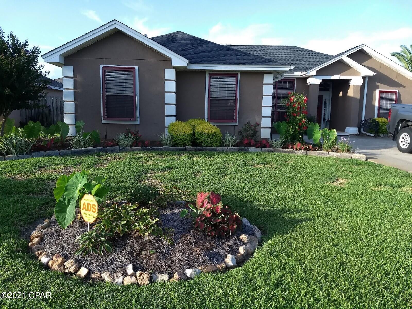 3 bed 2 bath built in 1997 on 8,351 sq ft – located 1000 ft from Gulf- roughly 40 ft above sea level. Exterior of house was painted within the last 3 mos (elastic paint).  Pool & screen .Home has been completely remodeled since 2016- crown molding, kitchen aid SS appliances inc. undercounter ice maker, 40 inch pantry; soft close hinges. Hardwood tile flooring throughout the home, a barn door to master bath, custom tile shower, walk in closet, stone gas fireplace. Full Hurricane protection for maximum discounts, deep water well, turf area for pet. Ceiling speakers in LR. Security system.  Beautifully landscaped!