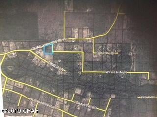 Wooded Acreage, perfect for a new Home or get-a-way Mobile Home, less than 20 miles to Panama City beautiful Sugar Sand Beach.