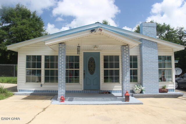 Privacy! Privacy! Privacy! If privacy and space are what you're after, look no further. This 2.5-acre property offers the best of both worlds — a partially wooded lot with mature oaks and open space for endless possibilities. A privacy fence lines the road frontage, making it easy to enjoy the peace and quiet without seeing your neighbors.  Bring your family, friends, horses, and farm animals — there's room for everyone! Start your dream garden, plant fruit trees, or just relax and enjoy the tranquil surroundings. The home has seen numerous updates starting in 2023, including: Fresh interior paint, New flooring and fixtures, Updated appliances, Two energy-efficient 110-volt water heaters (solar-convertible), energy efficient Mini Split unit & Four window-mounted heat pump inverter units (heating & cooling), New well with a 110-volt soft-start water pump.  The third bedroom is oversized and flexible, offering space for a custom closet in the location of your choice. The master suite features a walk-in closet and a full bath with a tub/shower combo.  Need workspace? The large garage/workshop is ready for your tools, cars, and hobbies — it even includes an engine lift! There's also an attached storage room and several outbuildings, all with electric and water already connected.  This unique and versatile property is priced to sell — don't miss your chance to own a little slice of country freedom with modern updates!