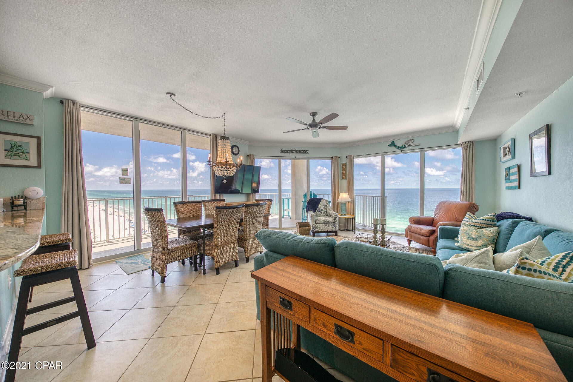 Welcome to Paradise!  This three bedroom end unit features  wraparound floor to ceiling windows with stunning gulf views, enjoyable from both inside and outside the unit.  A perfect place to watch the fireworks!  The beautifully renovated unit has never been rented and meticulously maintained. Featuring two master suites with stunning gulf views, three full baths, a bunk room for the kiddos, granite countertops, stainless steel appliances and much more.  Unit has been equipped with many automated features including a Ring doorbell, Wifi thermostat and a Wifi Schlage front door lock, all making it a breeze for remote property management or for security when you're away.  Conveniently located just steps from the end elevator allowing to you to skip a lot of the traffic. Unit is being sold with a set of chairs and umbrella for the 2021 season, in addition to the free chairs for owners.  Tidewater boasts some of the best amenities on the beach including a state-of-art fitness center, on-site movie theater, owner's lounge, arcade, restaurant and bar, 3 pools (one is an indoor pool), two hot tubs, Starbucks coffee and store, a gated parking deck and 24 hour security.  Last but not least, Tidewater is located just a short walk to Pier Park and great restaurants!