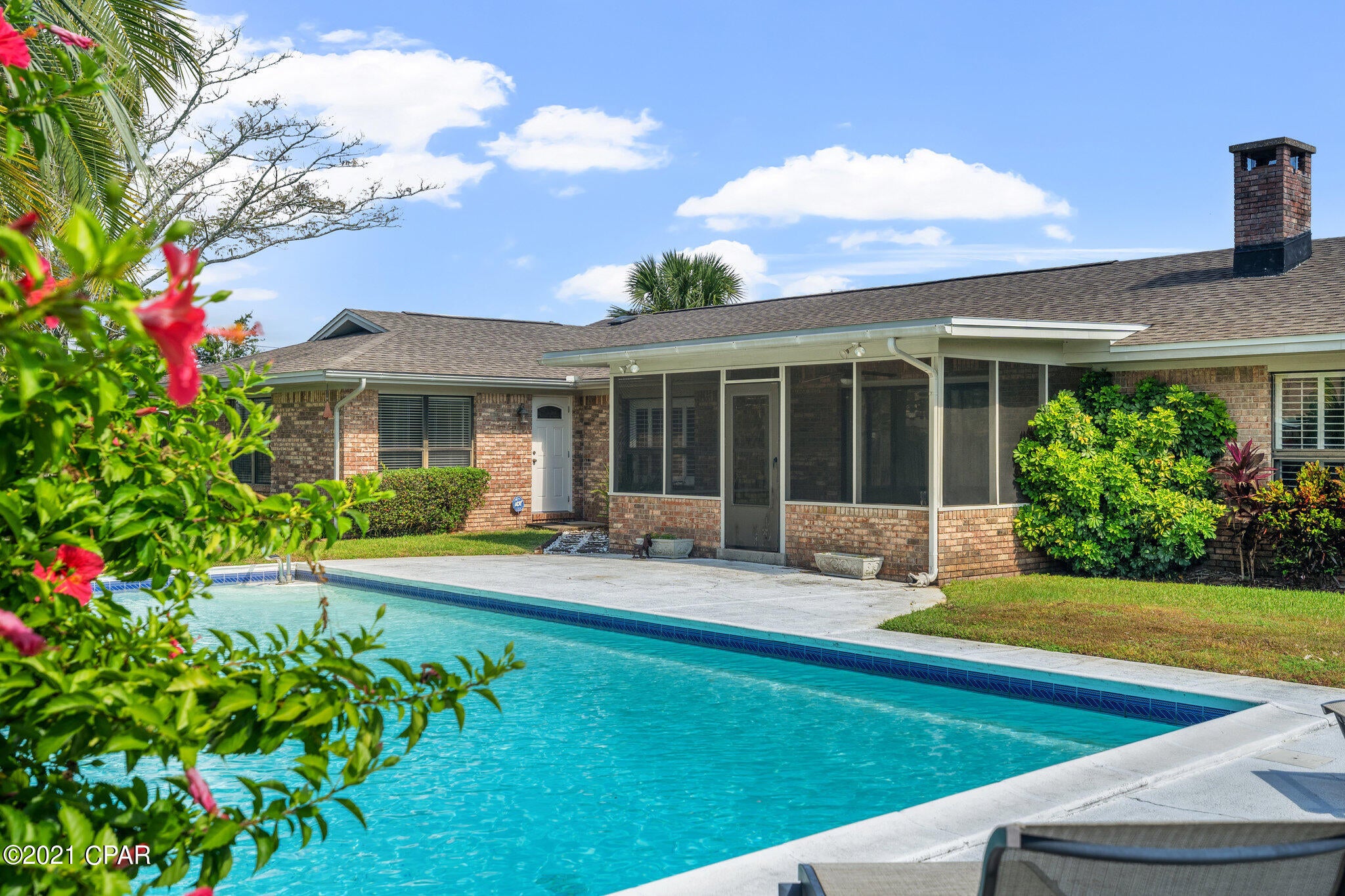 You must see this immaculate family home in Kings Point.  From the leaded glass entryway to the privacy fenced backyard this home features a lovely, understated, custom finish. An appealing double sided brick fireplace opens to both the living and dining rooms.  Ample, beautiful custom cabinetry and sophisticated black granite countertops will make the family chef feel right at home in the kitchen which opens to the family room. The entire home features plenty of windows and the living and dining rooms share a  beamed cathedral ceiling. Flooring is engineered hardwood throughout the living areas.  The master bedroom is large and sunny with ample storage in his and hers closets.  The master bath features a custom double vanity, his and hers shower. The additional bedrooms feature built in cabinetry and ample closet space. Two bedrooms have custom vanities with sinks and quartz countertops.  The third bedroom features an office space with upper and lower custom cabinetry and granite countertop   The yard is well established and well cared for. The back yard is an oasis featuring a 18x 38 pool, a 9 x 17 screened patio and a Koi pond.  The garage is oversized for extra storage.  Pool table does not convey.