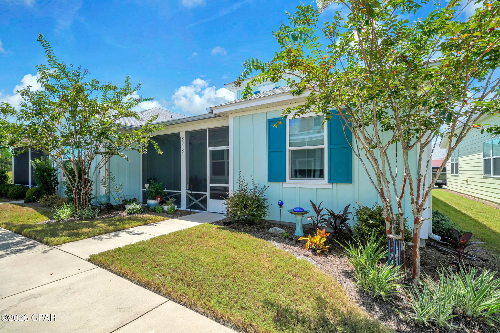 COME BE AT THE FRONT OF THIS LUXURIOUS NEIGHBORHOOD IN A LUXURIOUSLY APPOINTED UNIT! This beautiful unit is close to front of neighborhood  and yet still close to where all amenities are ready for your use! Tons of beautiful and unique upgrades was added to this beautiful unit to make it exceptionally decorated and built to be HOMEY! The dual sided Living space allows for quiet fireplace evenings or entertainment system usage. The wide open space living area is spacious and well appointed. This home is only a short 3/4 mile from the front of this highly desirable neighborhood and a straight shot to the beach minus the all the short term rentals! Close enough to enjoy the beach whenever you like but far enough away you dont have worry about STRs and can enjoy a community atmosphere! This 2 bed 2 bath unit  has multiple builtin closets, LVP and tile thruout, gas features, and a plethora of luxurious apoointments to make this home comfortable and beautiful! Make an appointment today to come see why this is the unit for you!