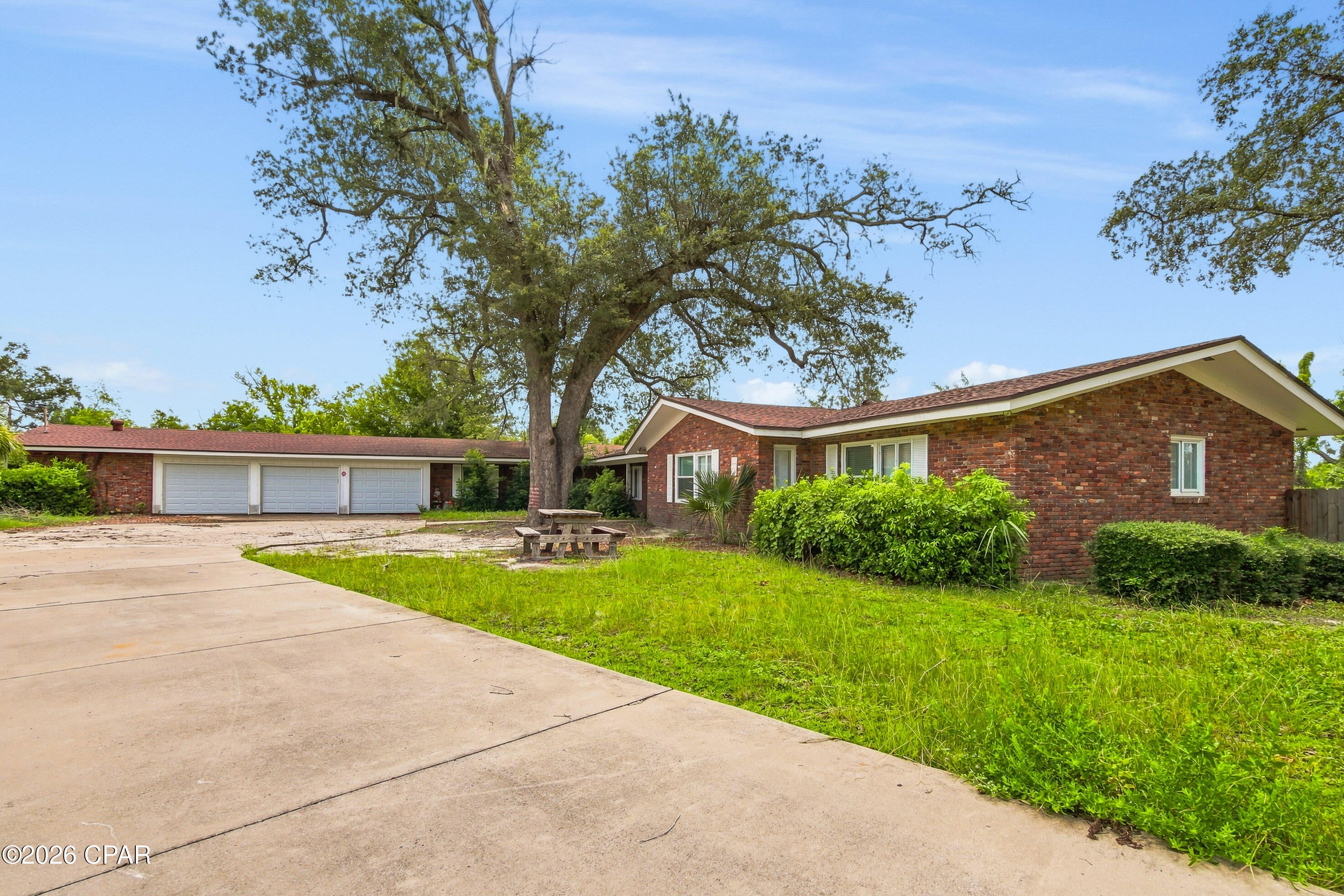 Welcome to this exceptional waterfront property located in Panama City, offering a unique blend of comfort, convenience, and coastal living. This home features a spacious circular driveway providing plenty of parking and a welcoming entrance. Enjoy the convenience of a 3-car garage with ample space for vehicles, storage, and hobbies.

Outdoor living takes center stage with a private deck overlooking the water, creating the perfect setting for relaxing, entertaining, or enjoying beautiful Florida sunsets. The private boat dock provides easy access for boating enthusiasts and those looking to embrace the waterfront lifestyle.

With its desirable location, impressive outdoor features, and thoughtful amenities, this property offers a rare opportunity to enjoy the best of Panama City living. Don't miss the chance to make this waterfront retreat your own.