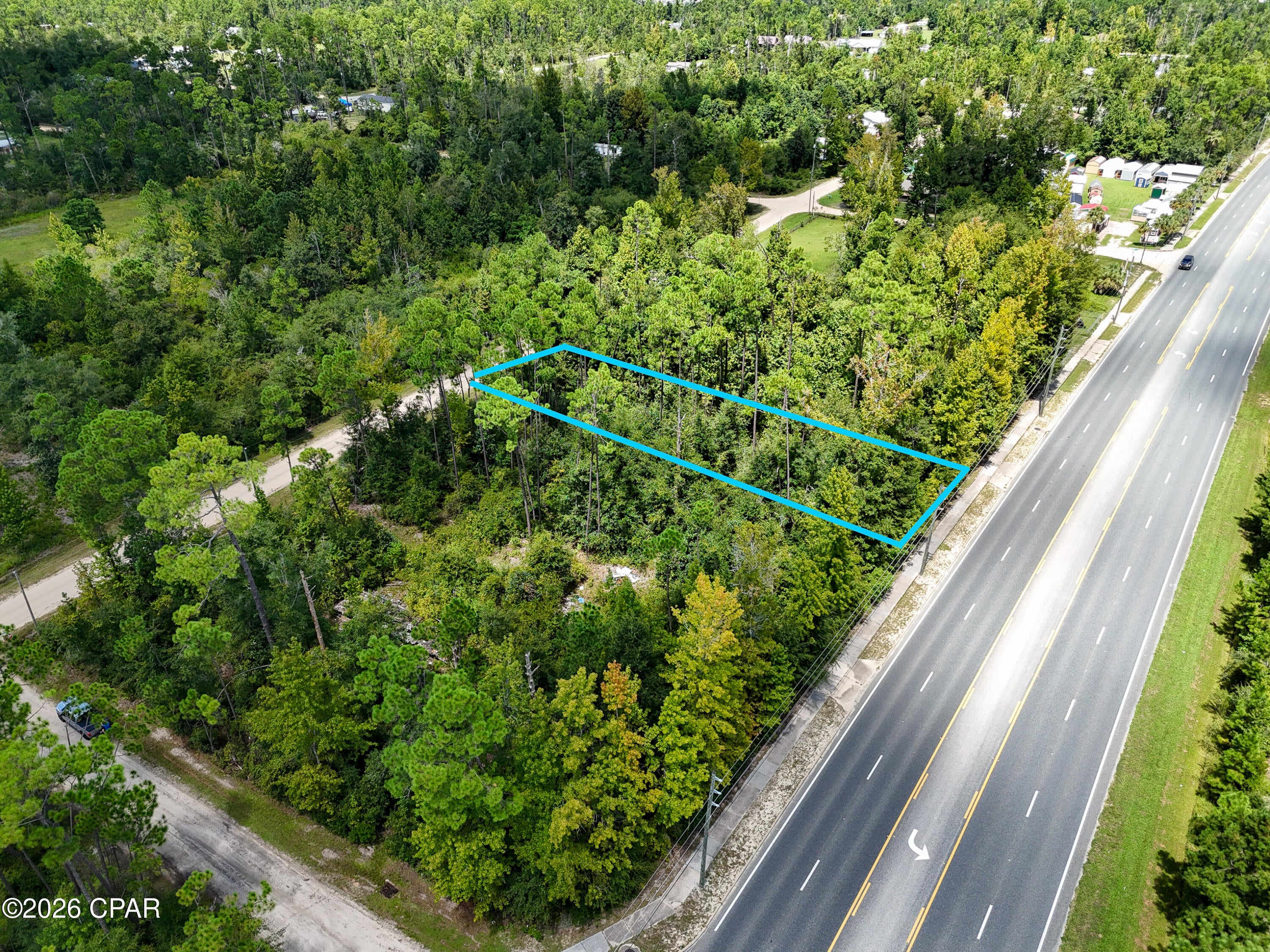 High-visibility commercial land opportunity located directly along Highway 231 in Fountain, Florida. Positioned on a vital arterial corridor connecting Panama City to I-10, this property benefits from excellent exposure with approximately 12,000 vehicles passing by daily. Zoned C-3 General Commercial and situated within the Fountain Rural Exclusion Zone (which allows residential uses), the site provides maximum operational flexibility for a wide variety of business or commercial enterprises. Whether establishing a retail storefront, office, equipment service operation, or general commercial facility, this versatile parcel is ideally positioned to capitalize on northern Bay County's ongoing growth. If you are needing more space, 000000 Park Place (MLS 794980) & 0000000 Lazy Lane (MLS 794983) are also available.