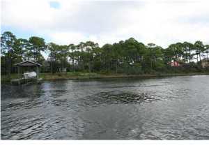 Don't miss this chance to own a wonderful waterfront lot with deep water access on North Lagoon Drive.Build your dream home and enjoy waterfront living with direct access to the Gulf of Mexico! In just a 20 minute boat ride you can be fishing in the Gulf.There is not a better place to call home than Grand Lagoon, the finest boating and dining location. Be close to legendary golf courses, St. Andrews State Park, Shell Island, and the best restaurants in town such as Captain Anderson's and The Boatyard. Pier Park Mall is just minutes away for the ultimate outdoor shopping experience with many great stores to visit.There is a new bridge over the Lagoon which has increased the water flow and flushing therefore enhancing the water quality and marine life on the western side of the