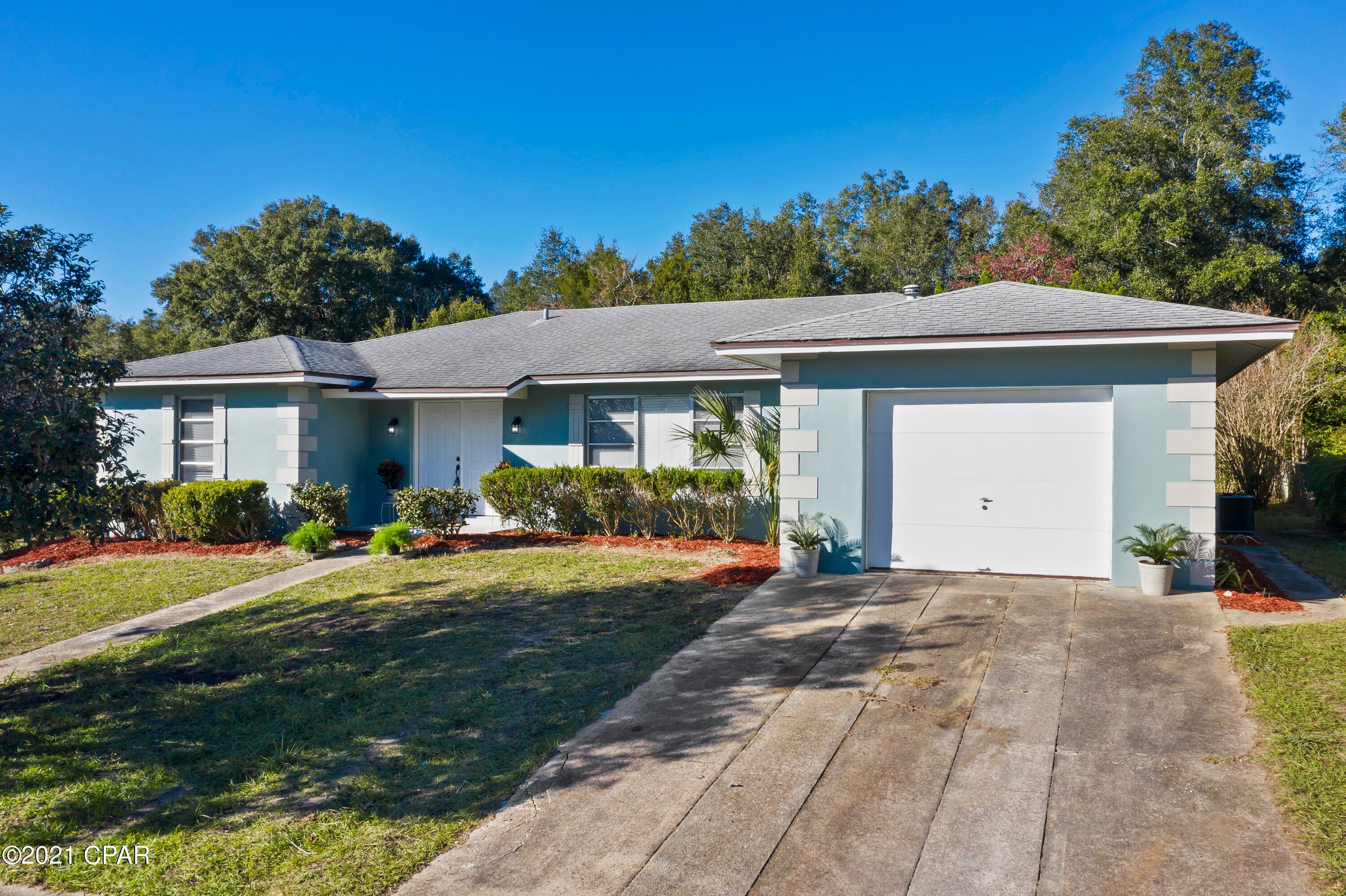 WOW!  This meticulously remodeled home is a stunner!  The home is located in Sunny Hills and just across the street from Watering Lake.  The home has a spacious living area and nice sized dining room.  The kitchen has nice shaker style cabinets, a large island, and backsplash.  The appliances are NEW!  The master suite has nice walk in closets and the mater bath features double vanity sinks and a tiled shower.  The back of the home features a patio area. with landscaping.  You don't want to miss out on this beauty!
